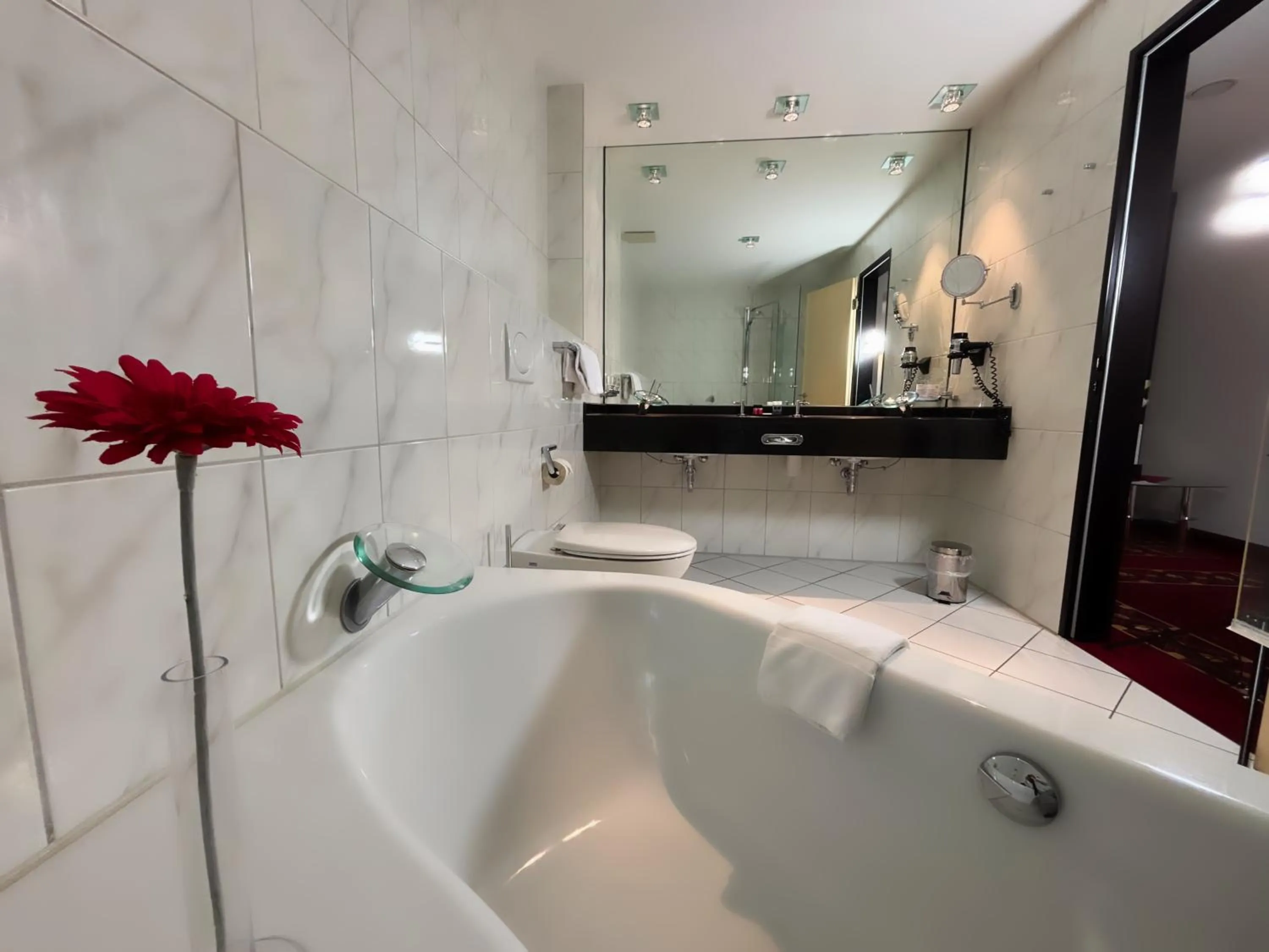 Bathroom in Aspire AcarA Oldenburg, Trademark Collection by Wyndham