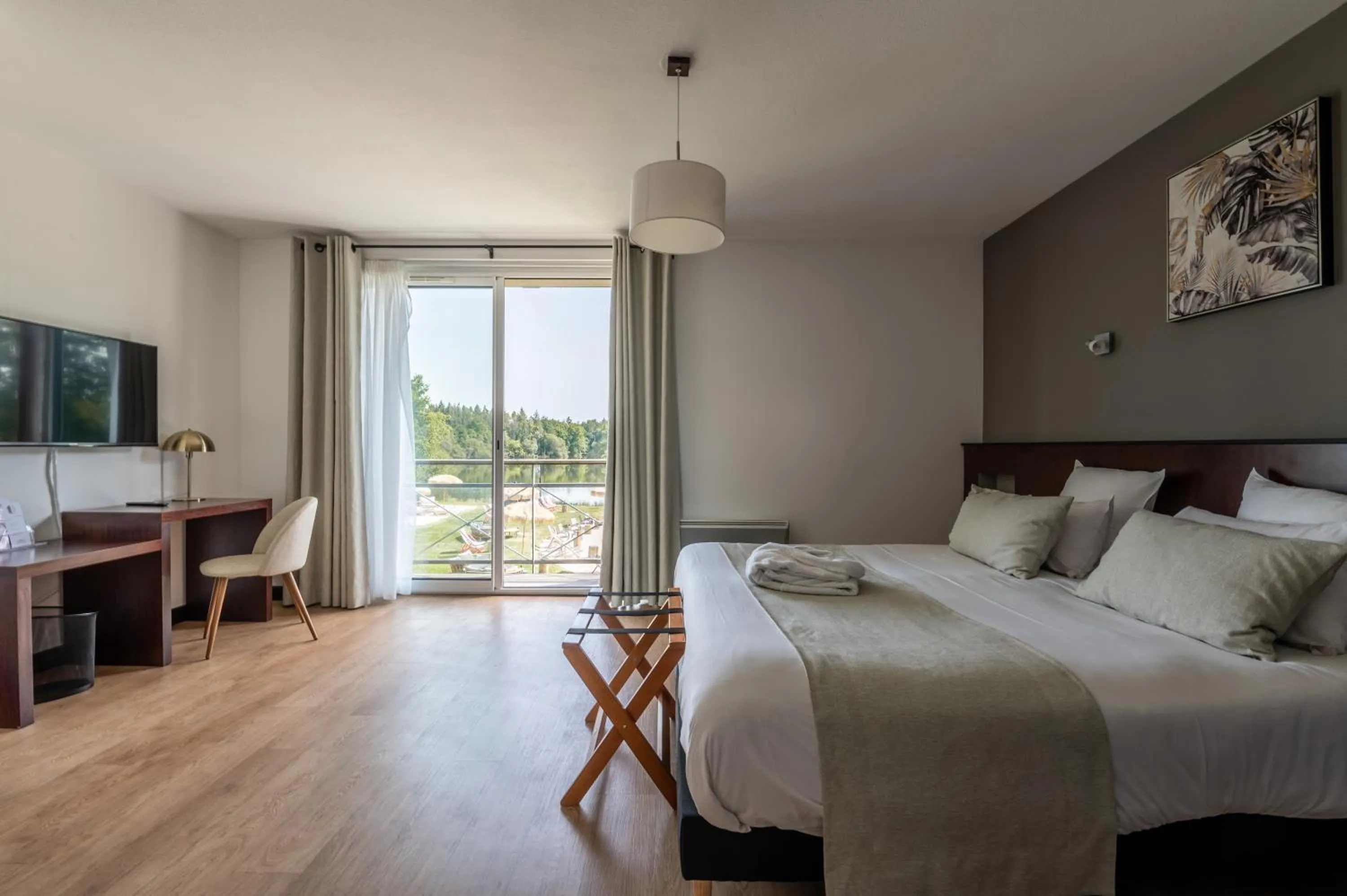 Photo of the whole room, Bed in Domaine de Cicé-Blossac, Resort Spa & Golf