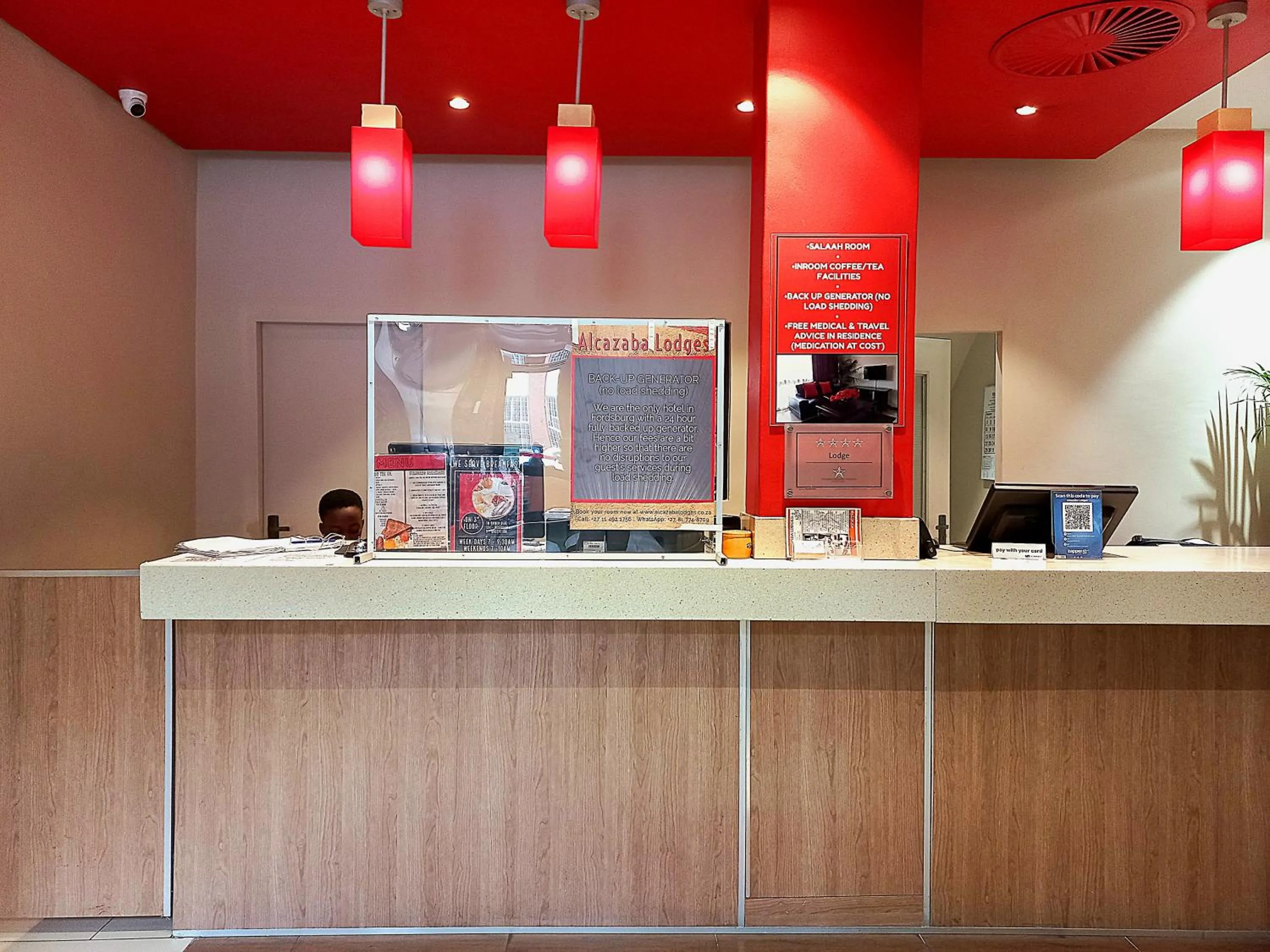 Lobby or reception in Alcazaba Hotel