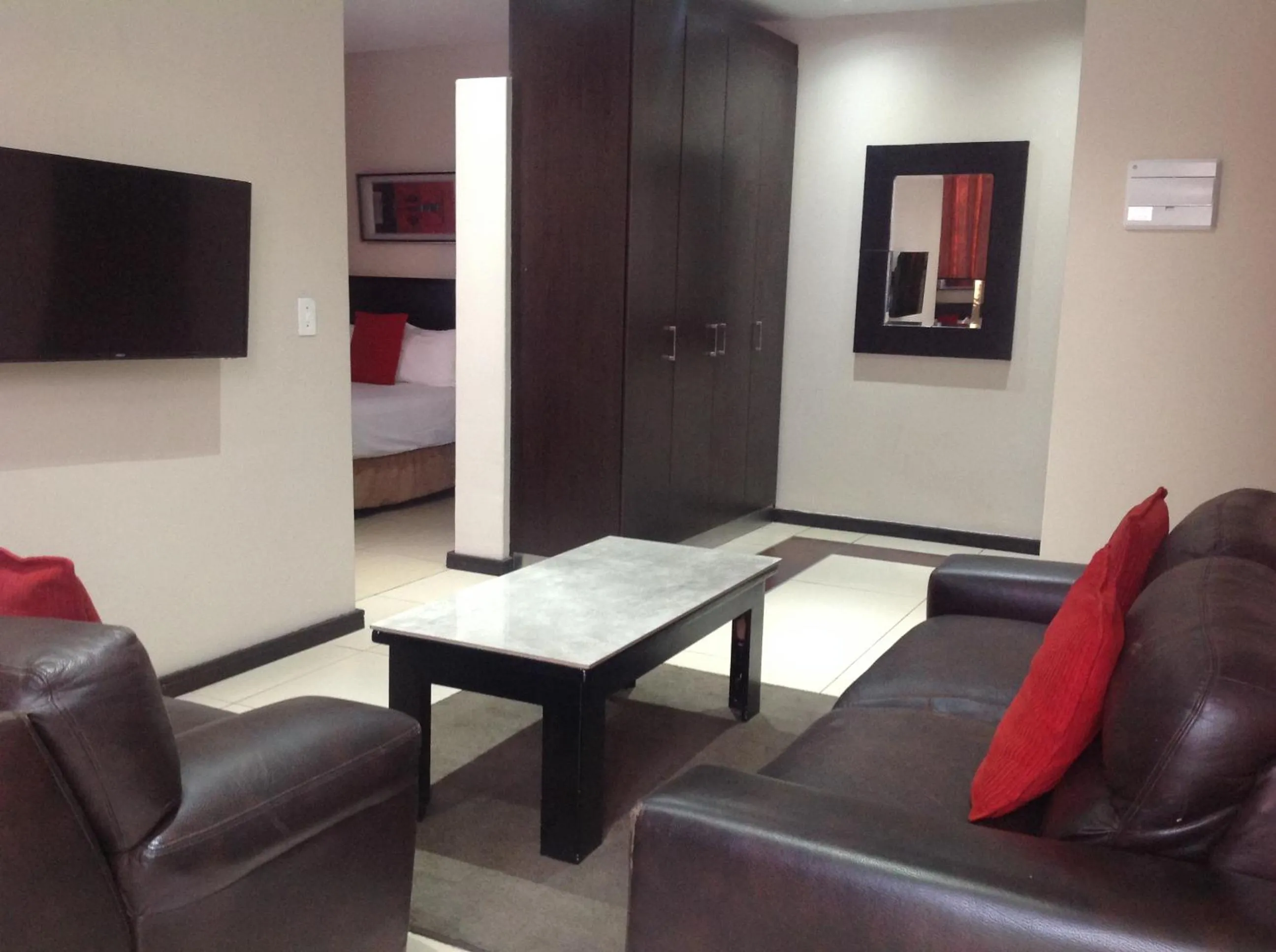 Communal lounge/ TV room in Alcazaba Hotel