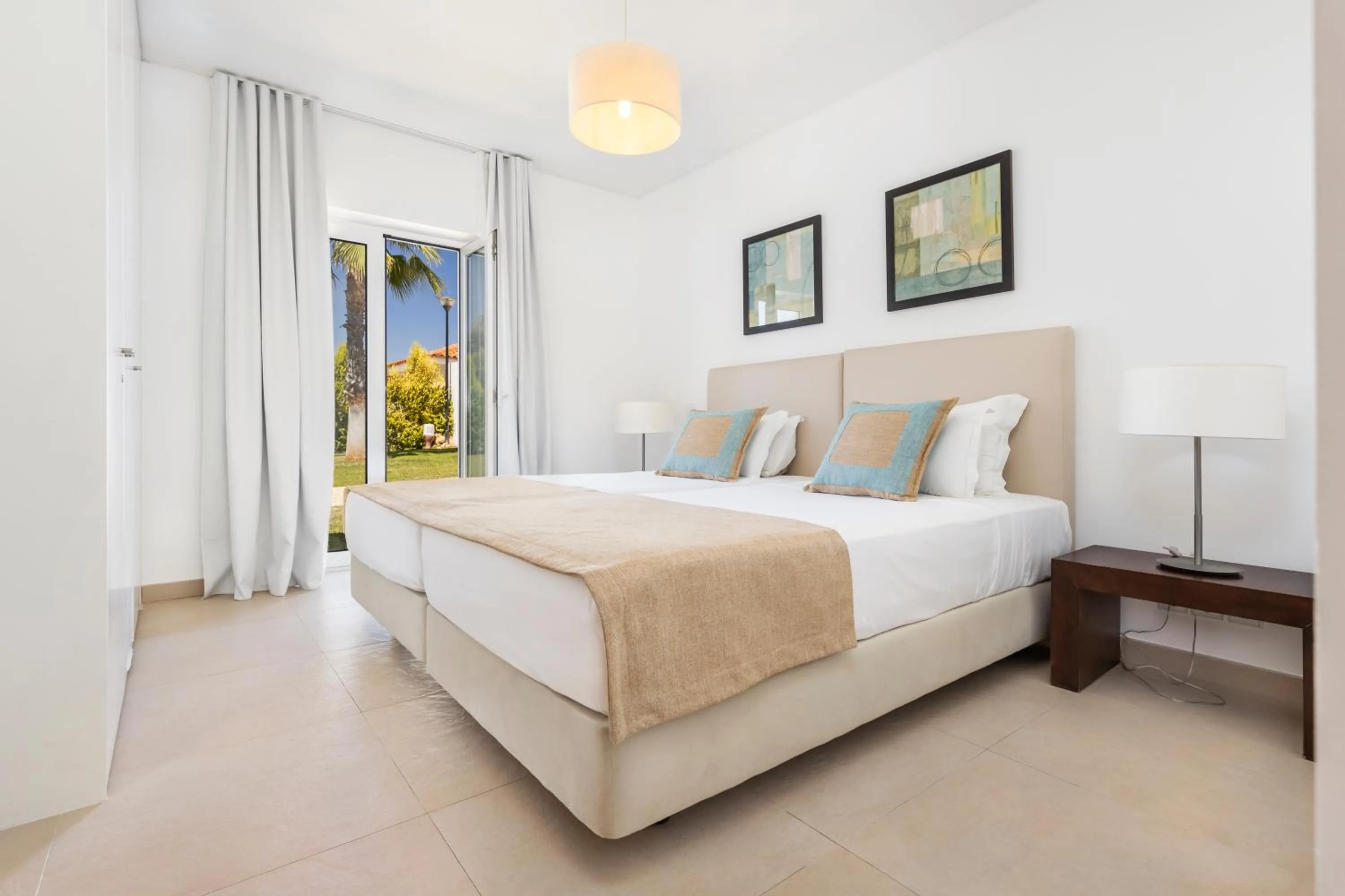 Bed in Eden Villas & Apartments