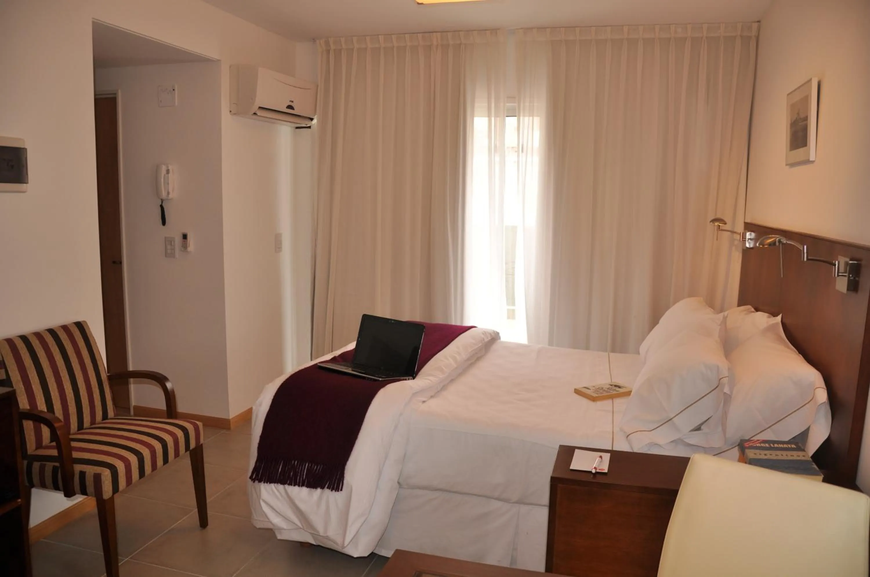 Bed in Livin' Residence Rosario