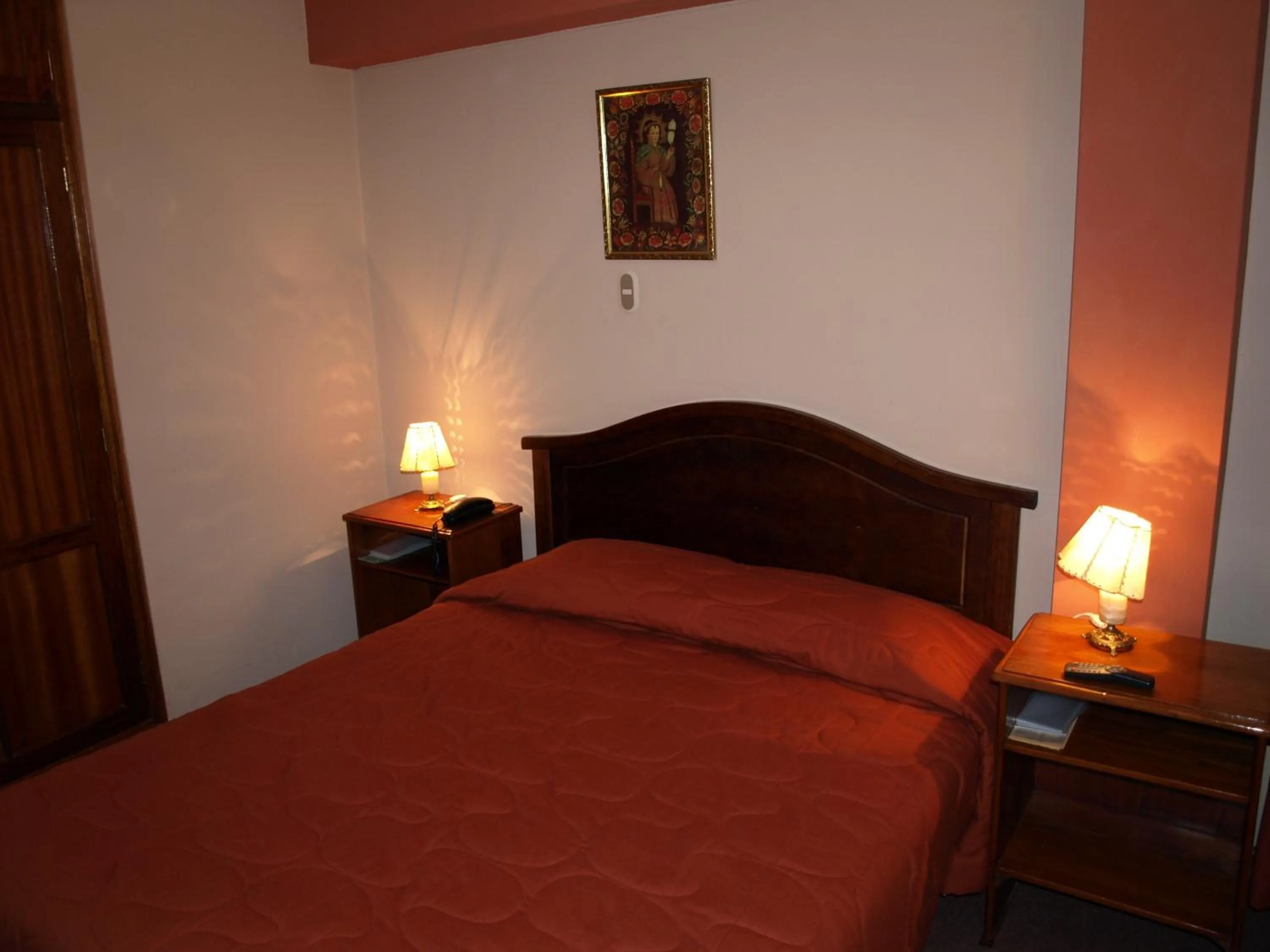 Bed in Qelqatani Hotel