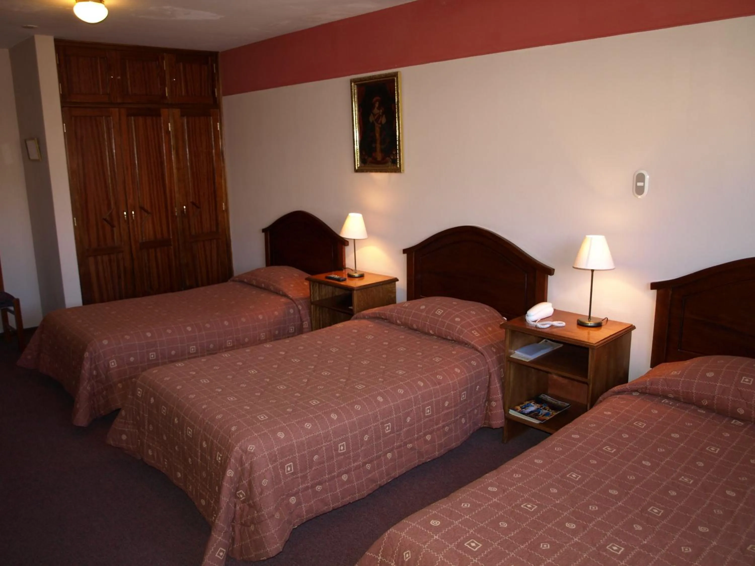 Bed in Qelqatani Hotel