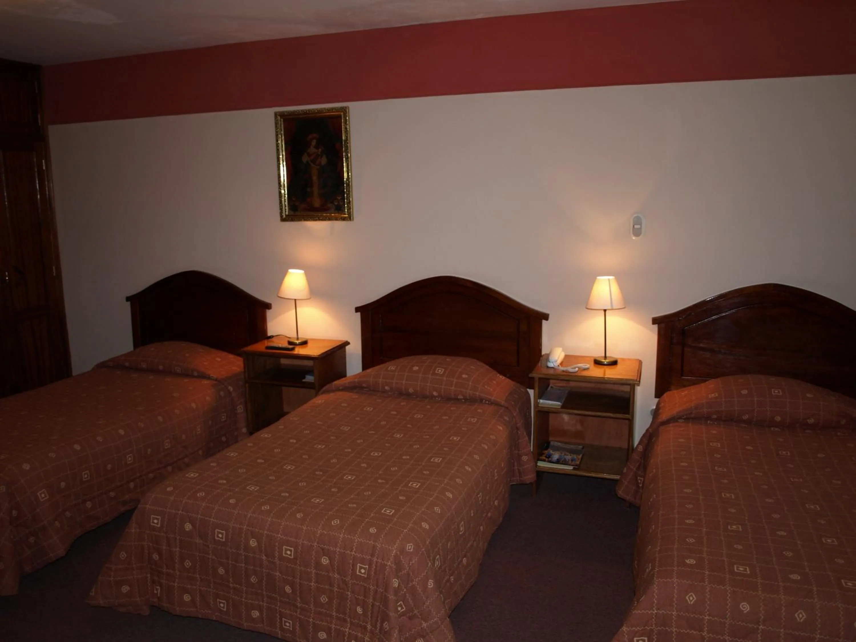 Bed in Qelqatani Hotel