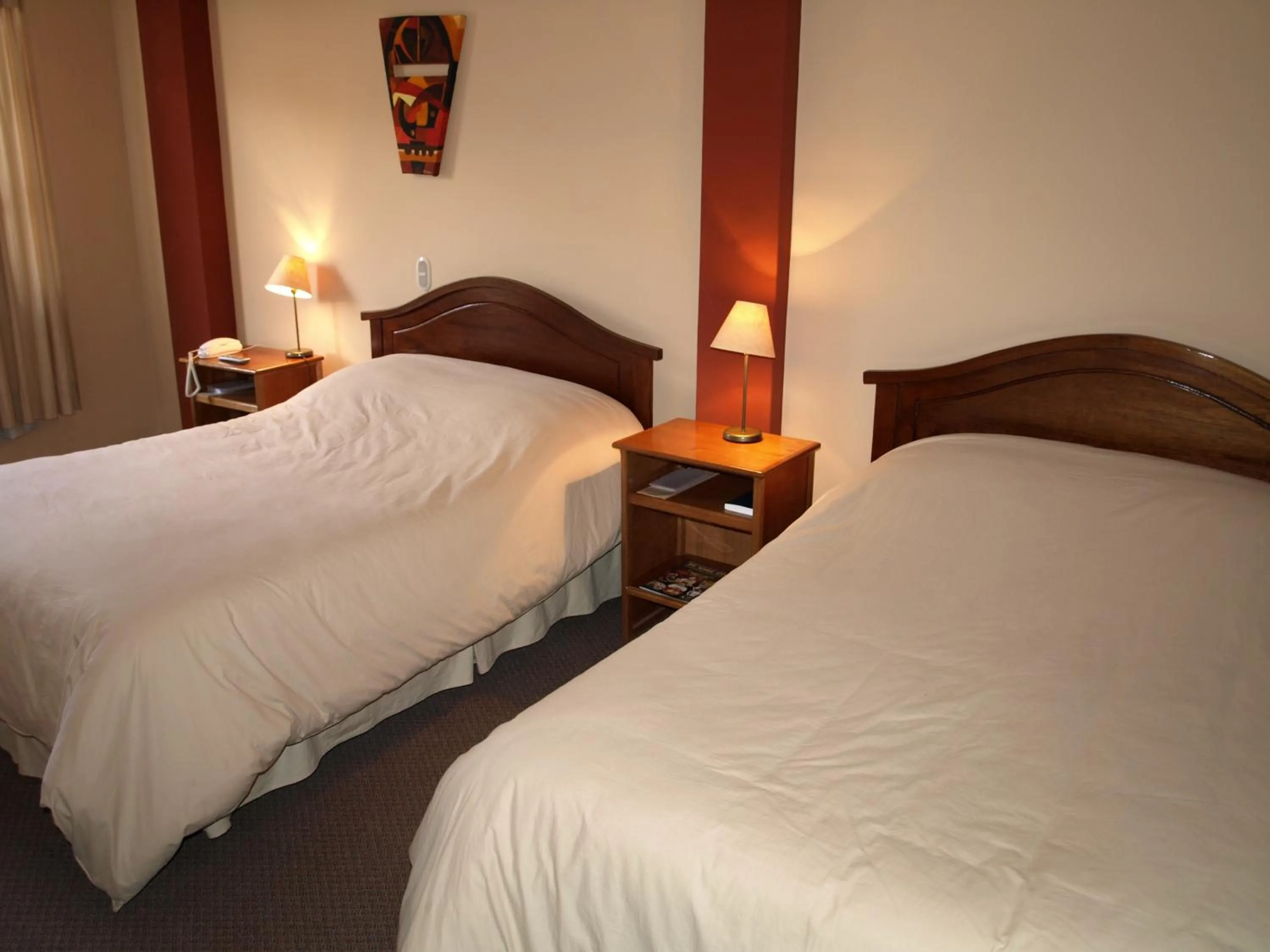 Bed in Qelqatani Hotel