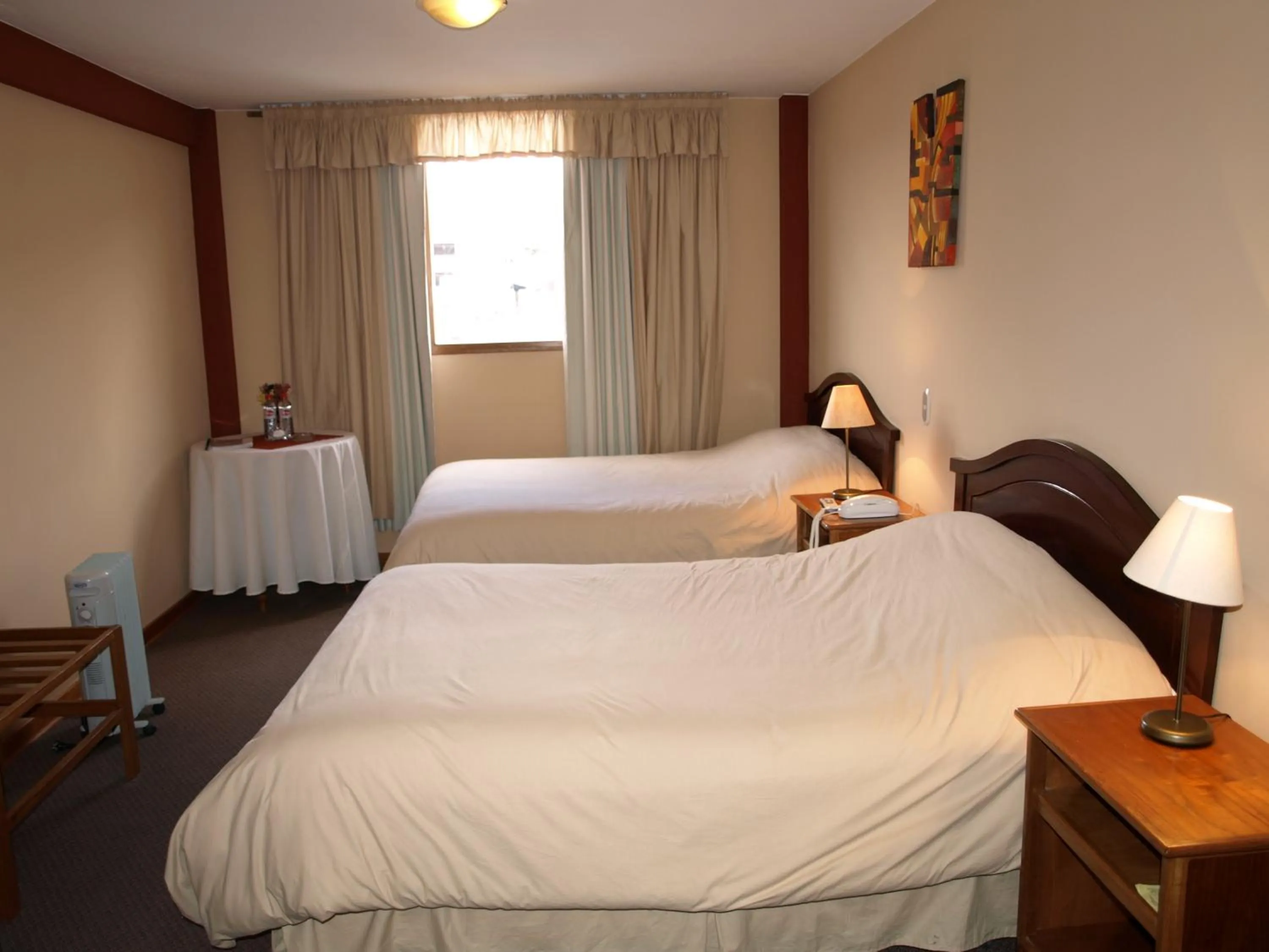 Bed in Qelqatani Hotel