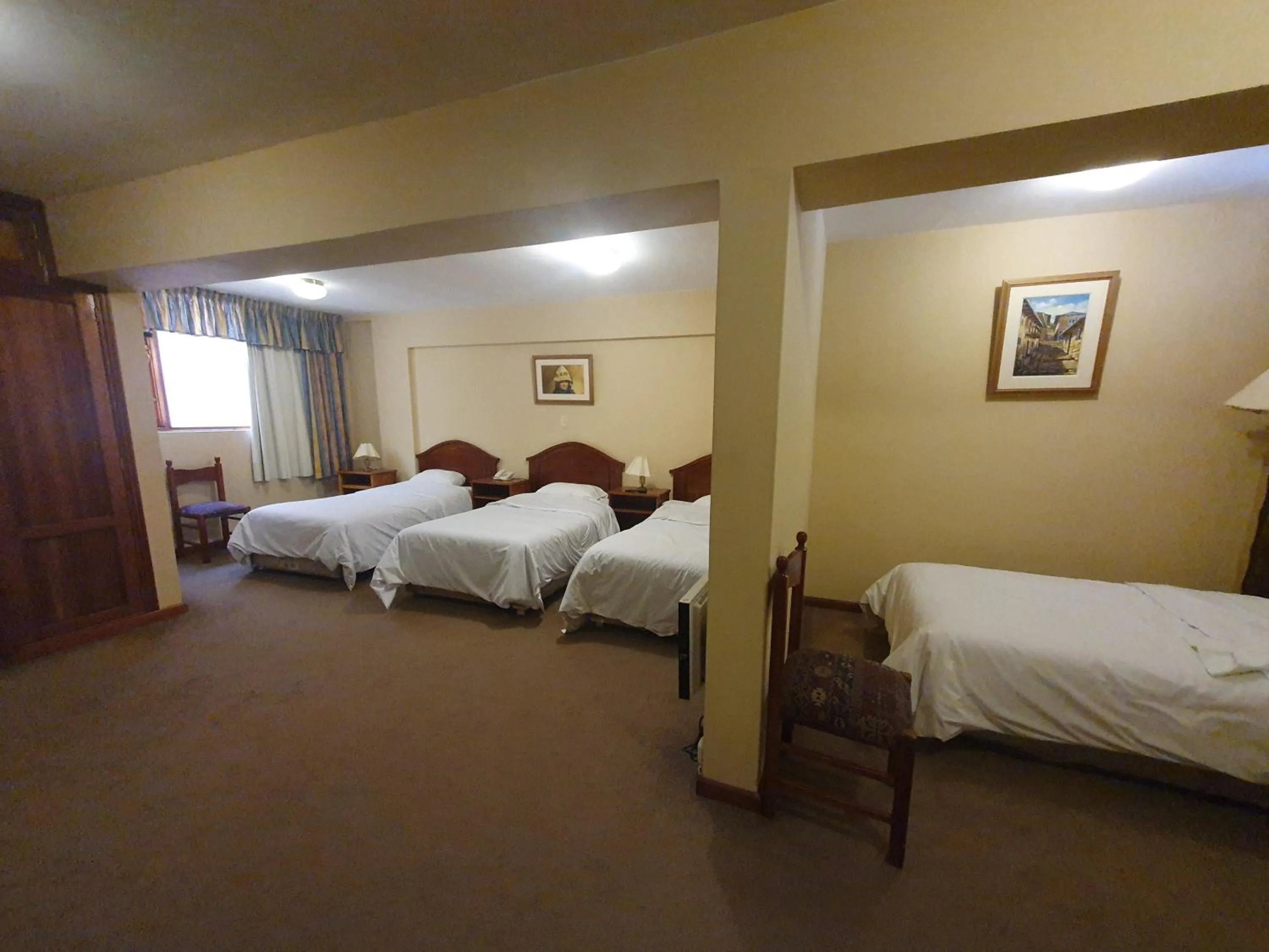 Bed in Qelqatani Hotel