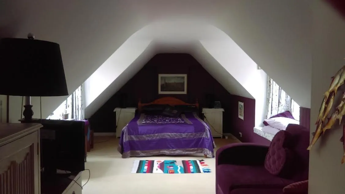 Bed in Orchard Pond Bed & Breakfast