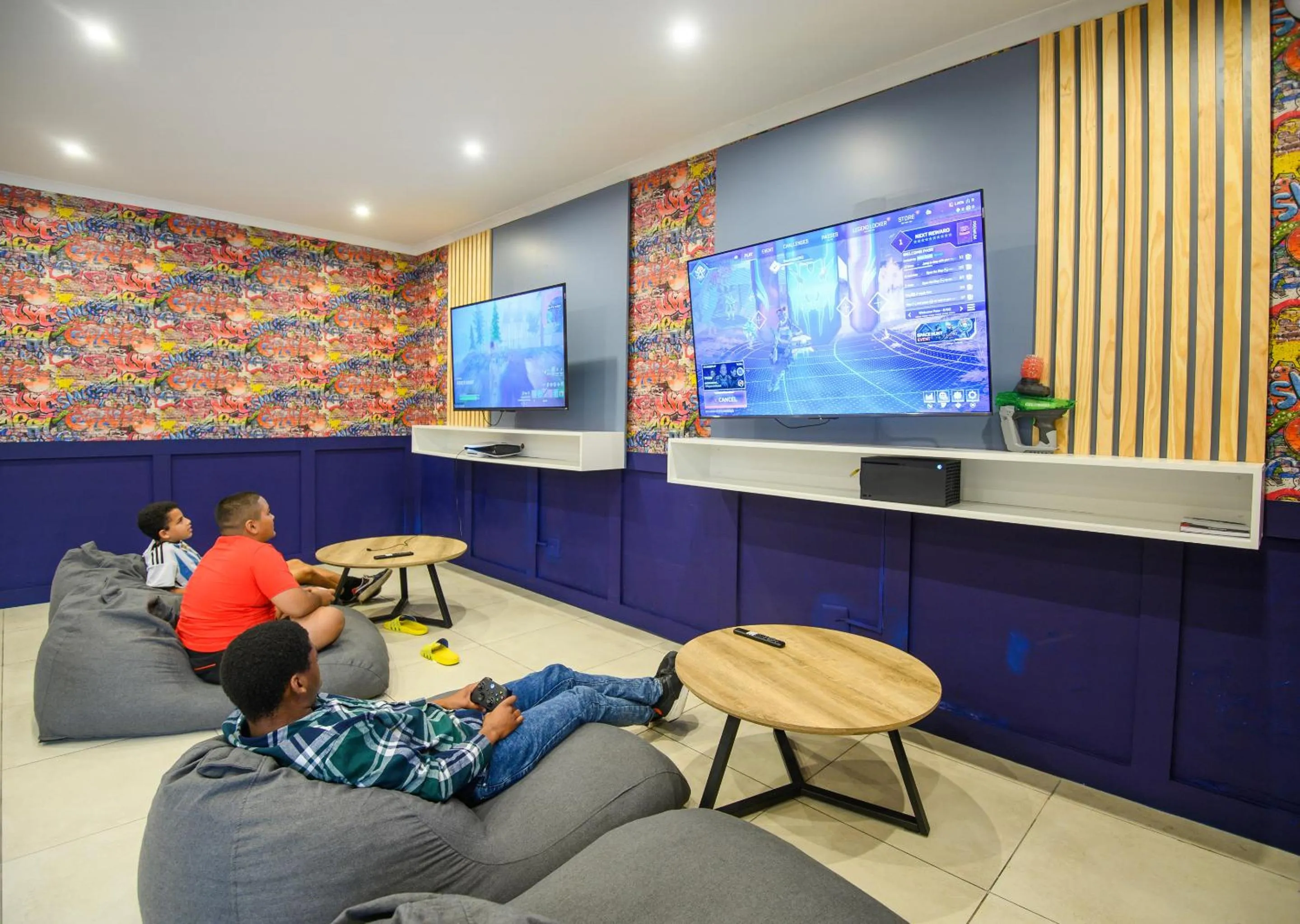 Communal lounge/ TV room in Blue Marlin All-Inclusive Seascape by Dream Resorts