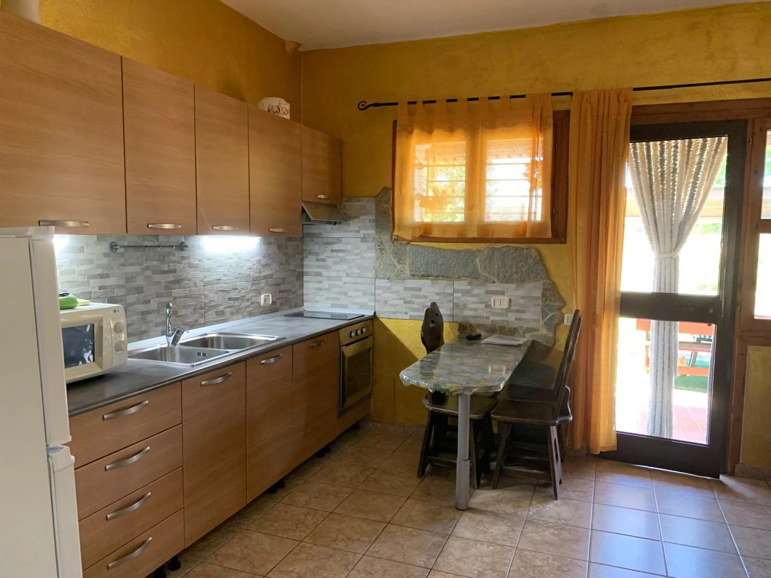 Kitchen or kitchenette in Villa Isabella