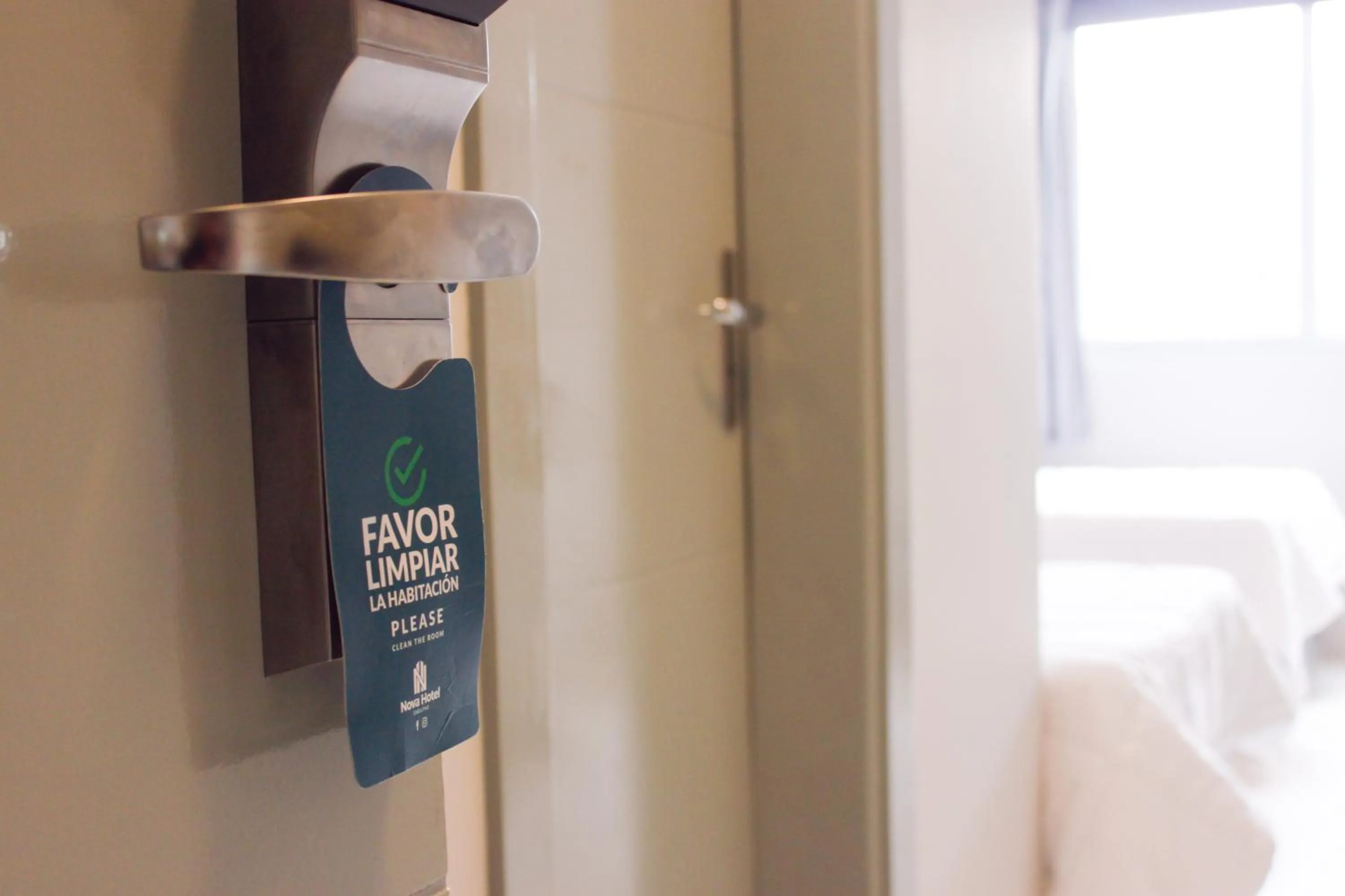 Property logo or sign, Bed in Nova Hotel