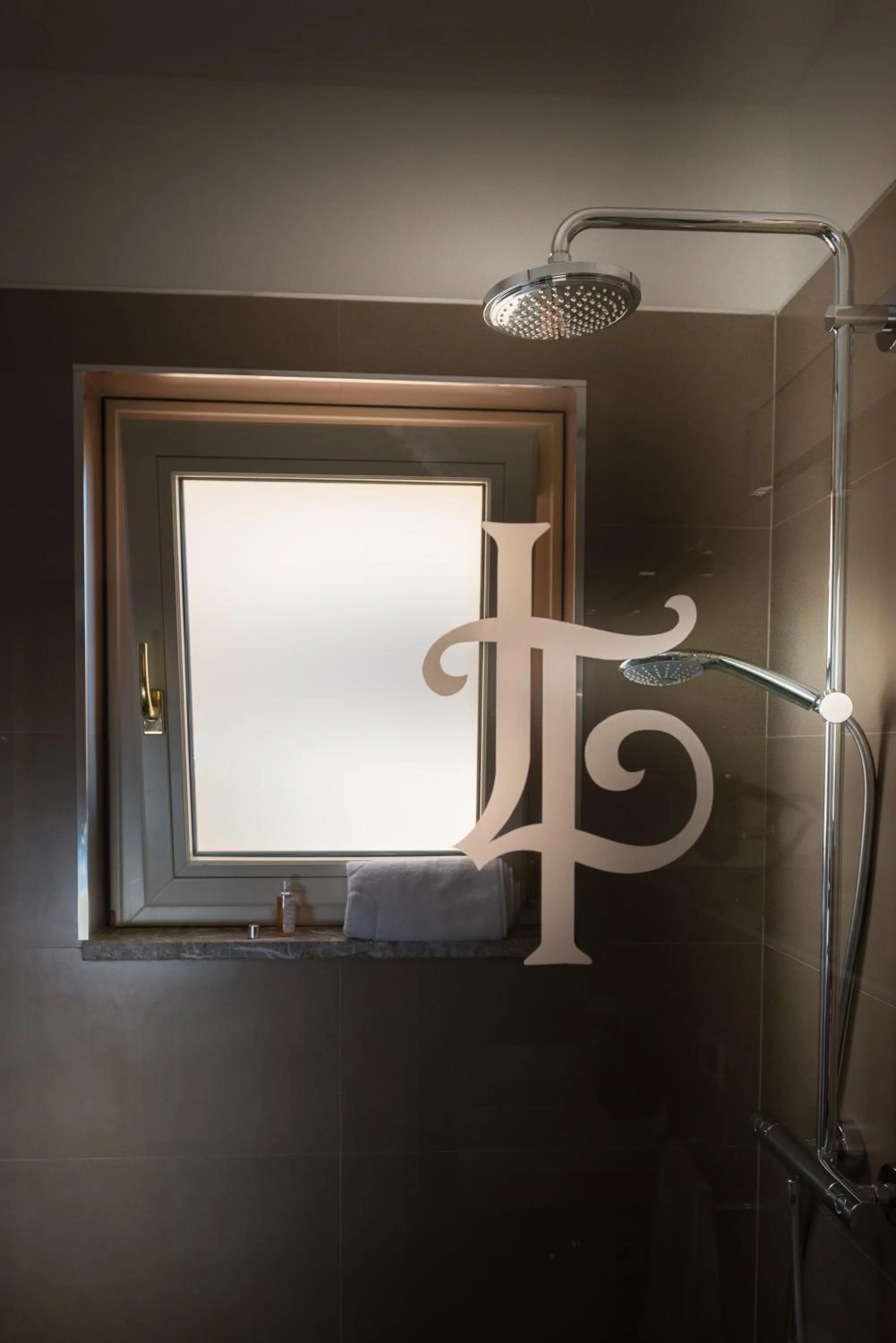 Shower in Villa Le Terrazze Charming Rooms