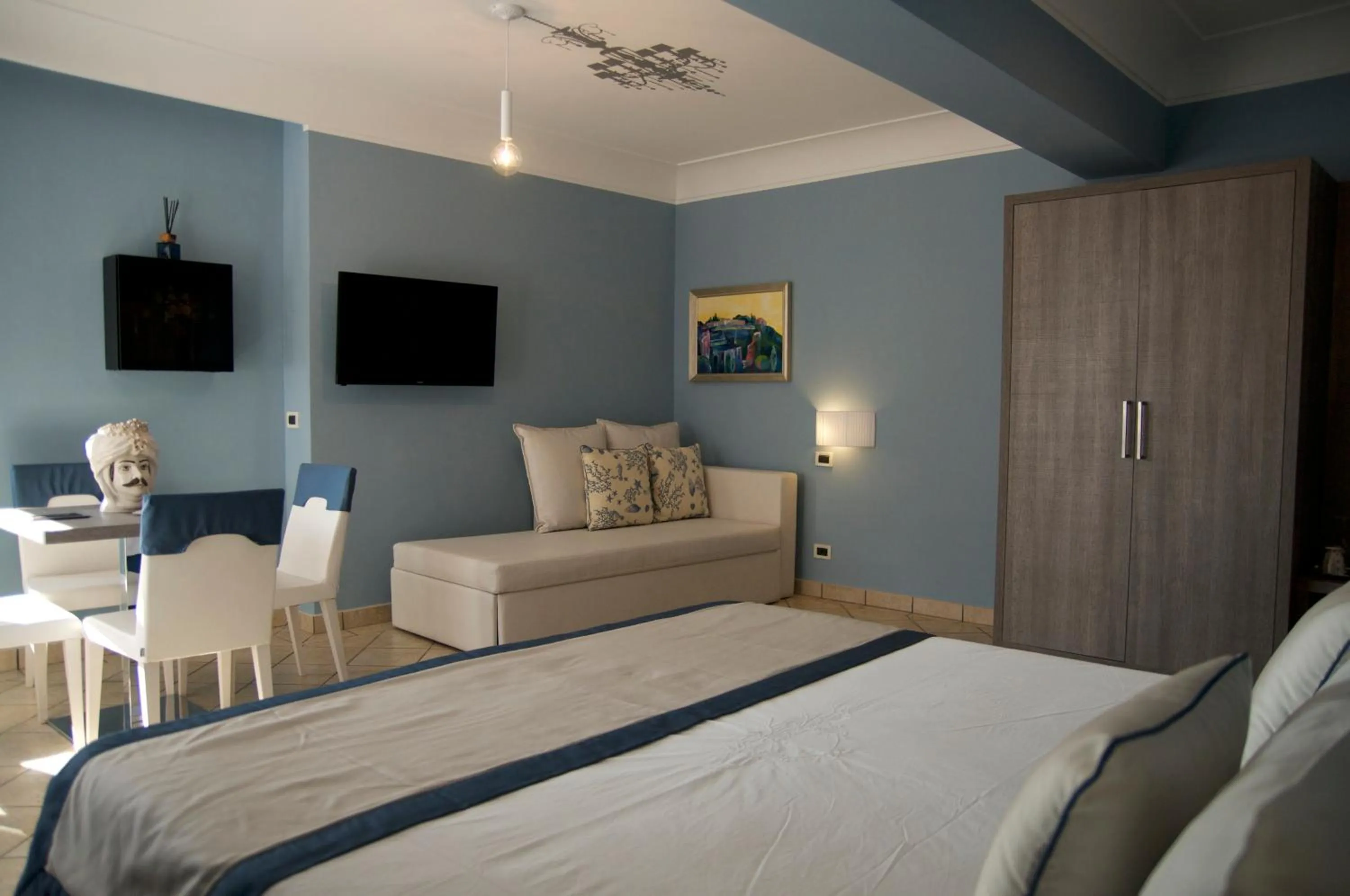 Bed in Villa Le Terrazze Charming Rooms