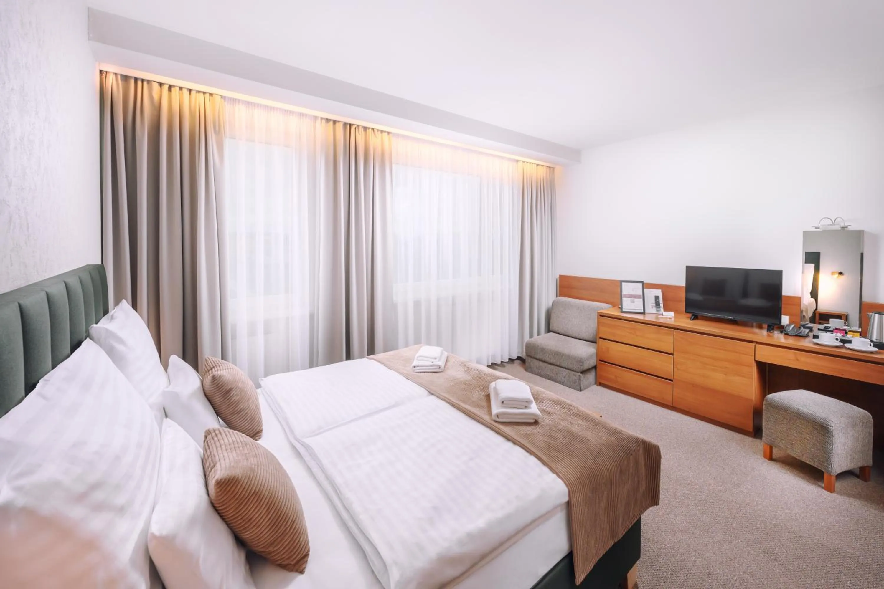 Bed in Hotel Janosik