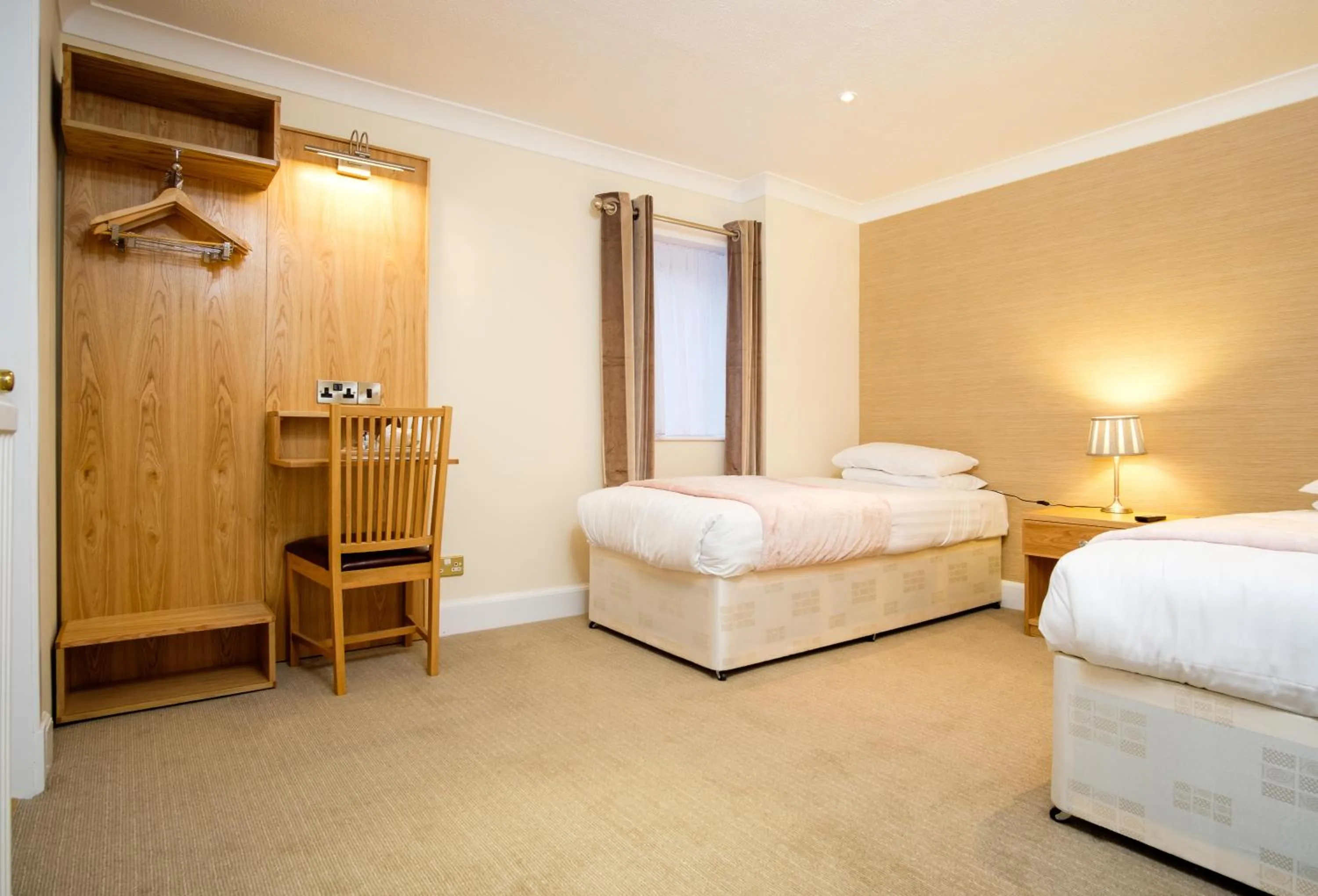 Bed in Adamson Hotel