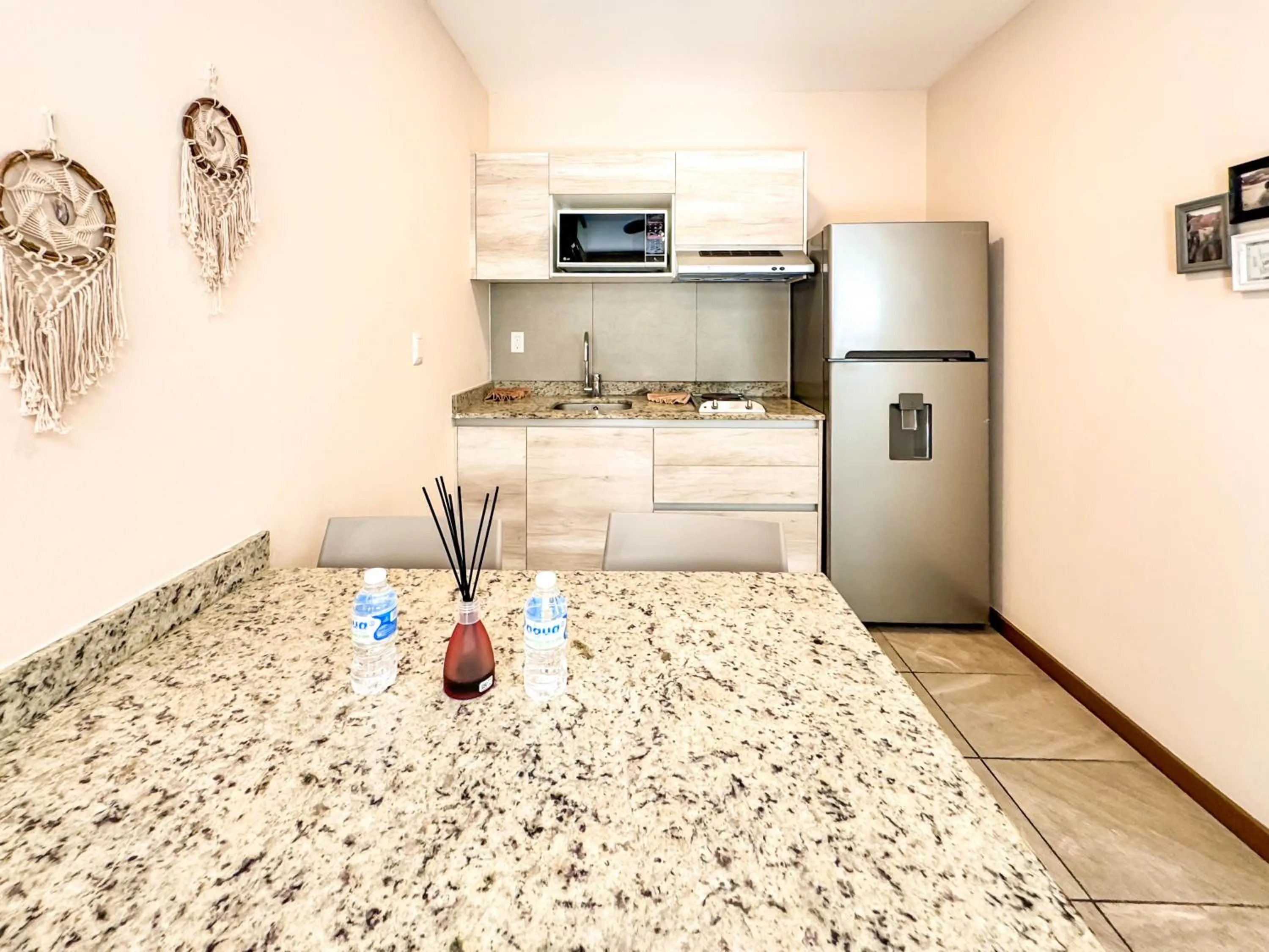 Kitchen or kitchenette in Grand Fifty Suites