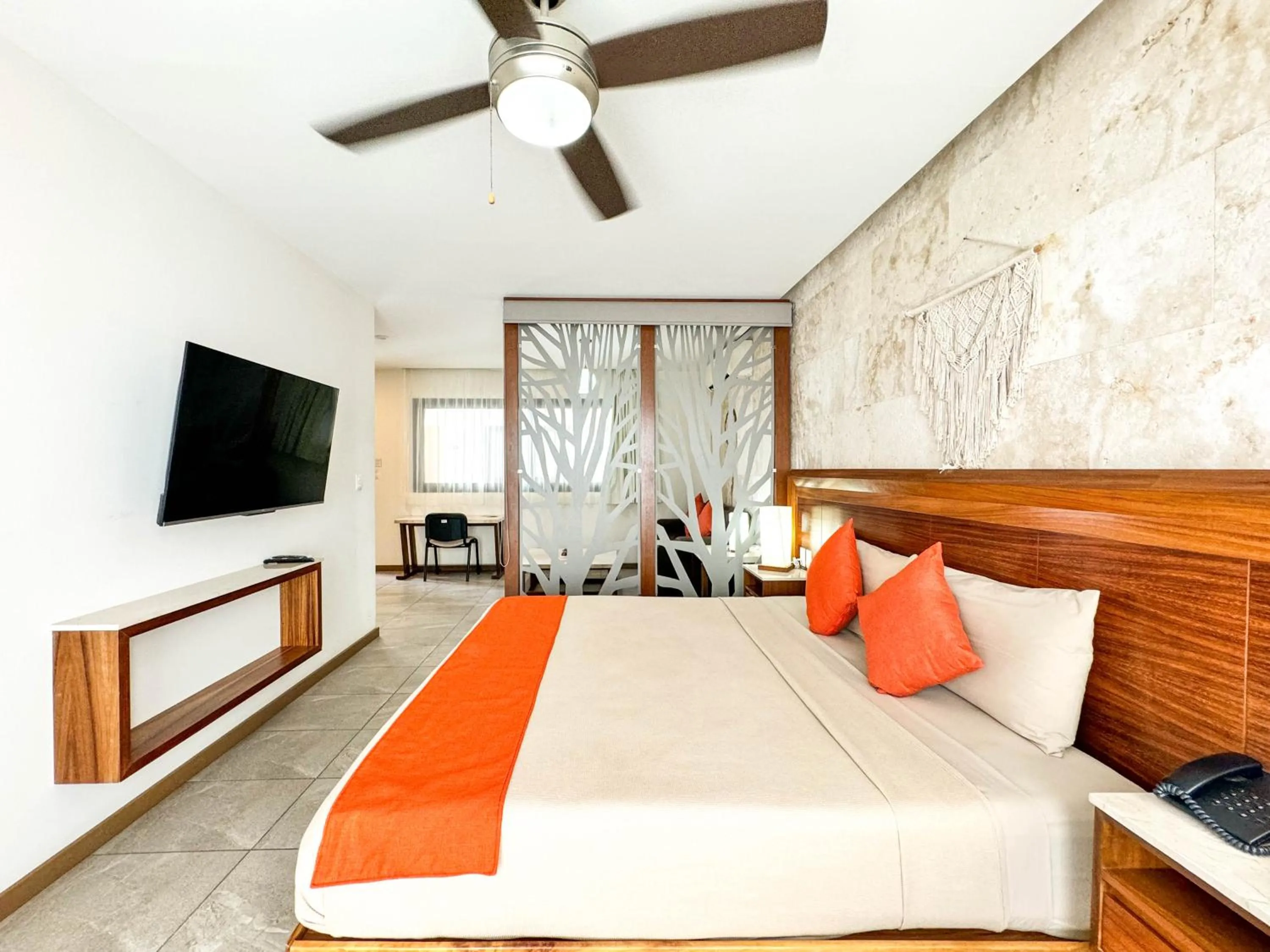 Bed in Grand Fifty Suites