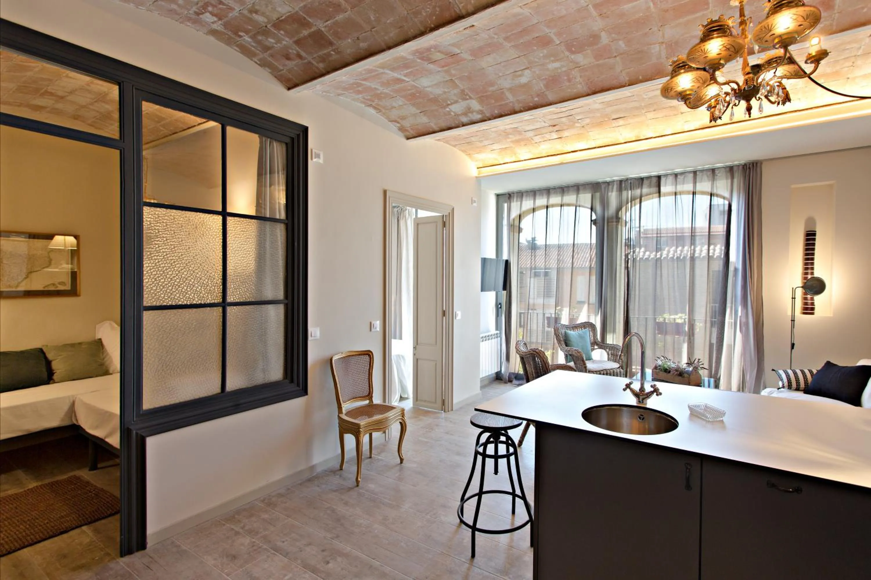 Dining area, Bed in El Jardinet de Sant Esteve
