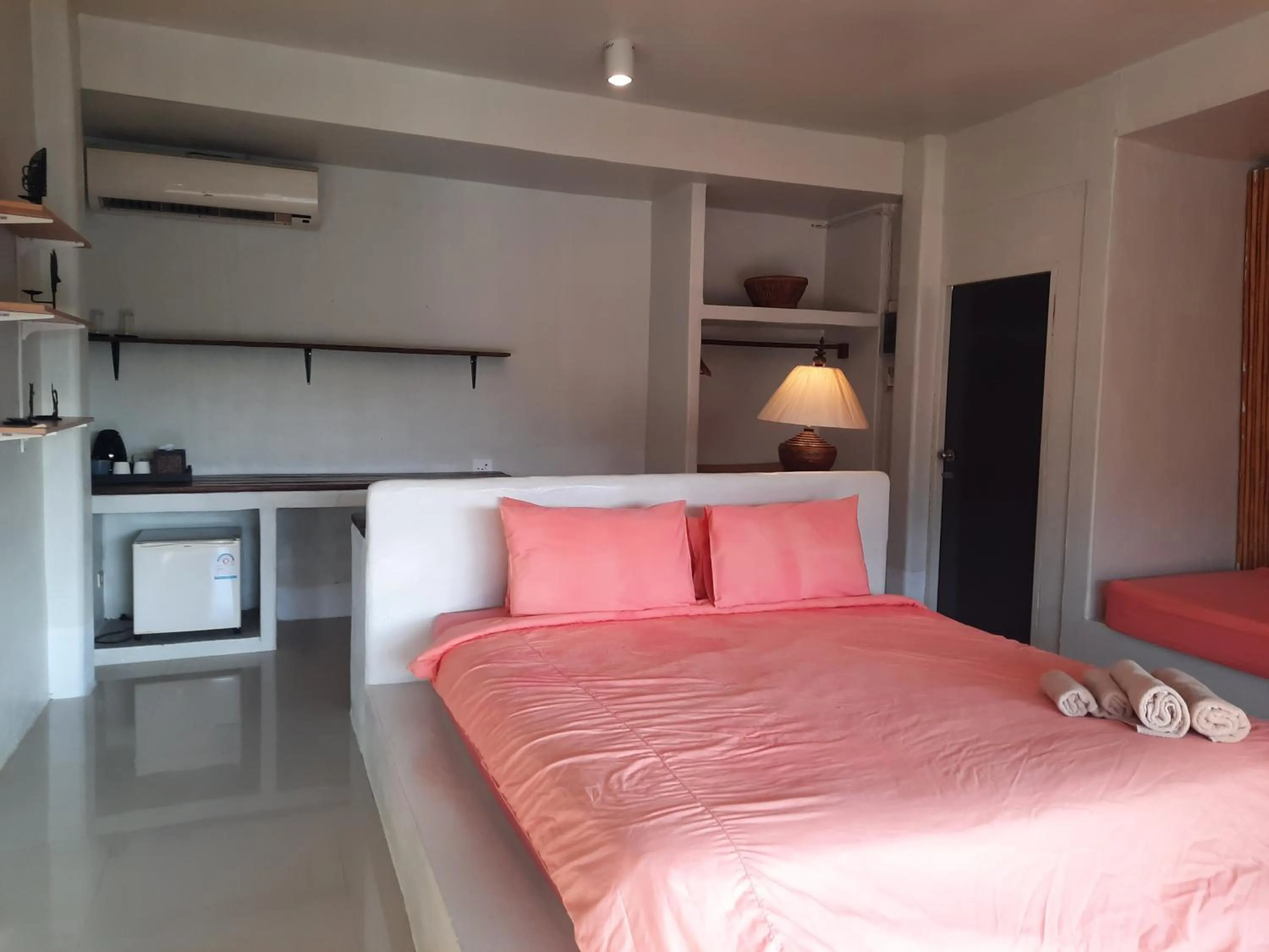 Bed in Chasorn Riverside Resort