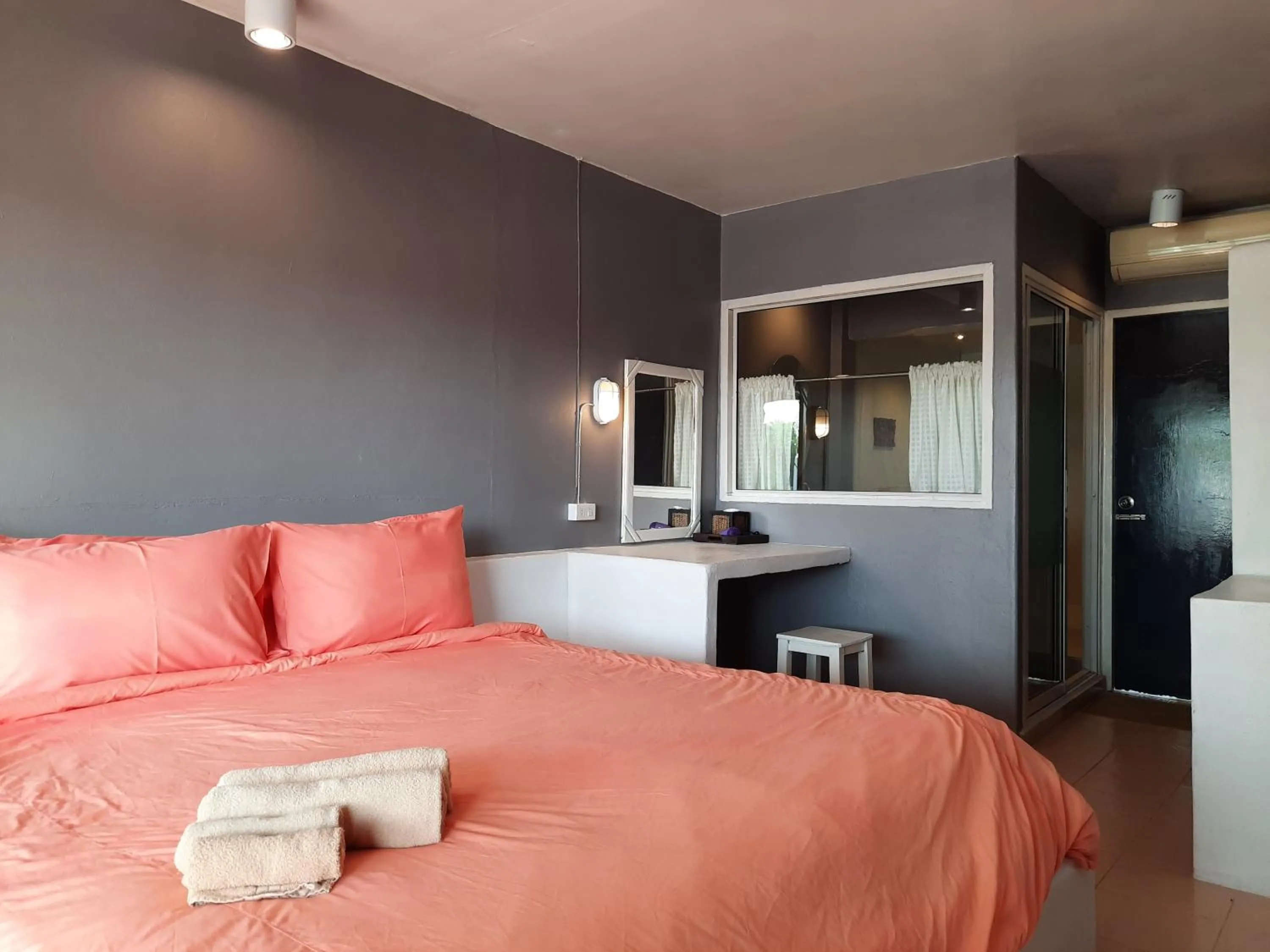 Bed in Chasorn Riverside Resort