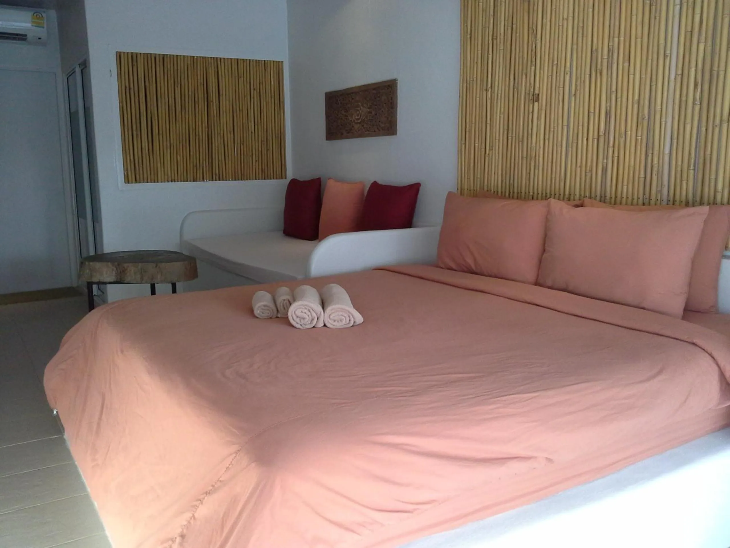 Bed in Chasorn Riverside Resort