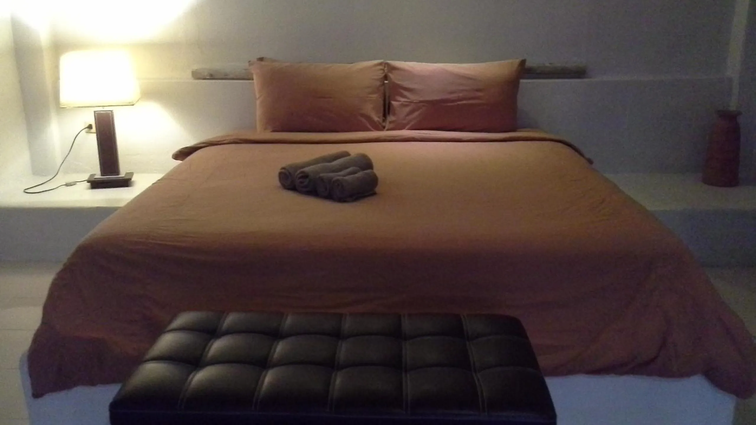 Bed in Chasorn Riverside Resort