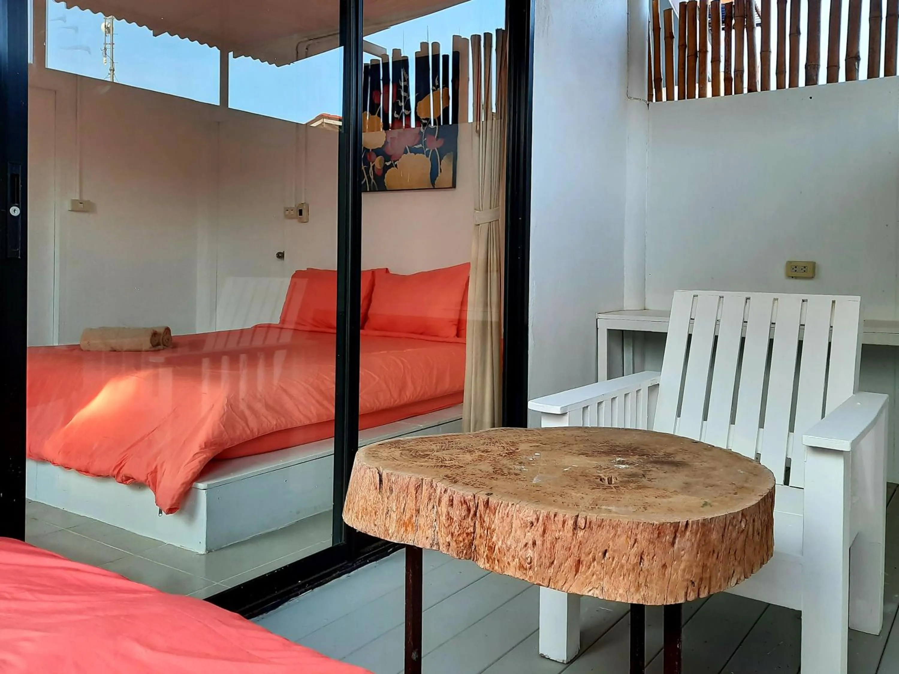 Bed in Chasorn Riverside Resort