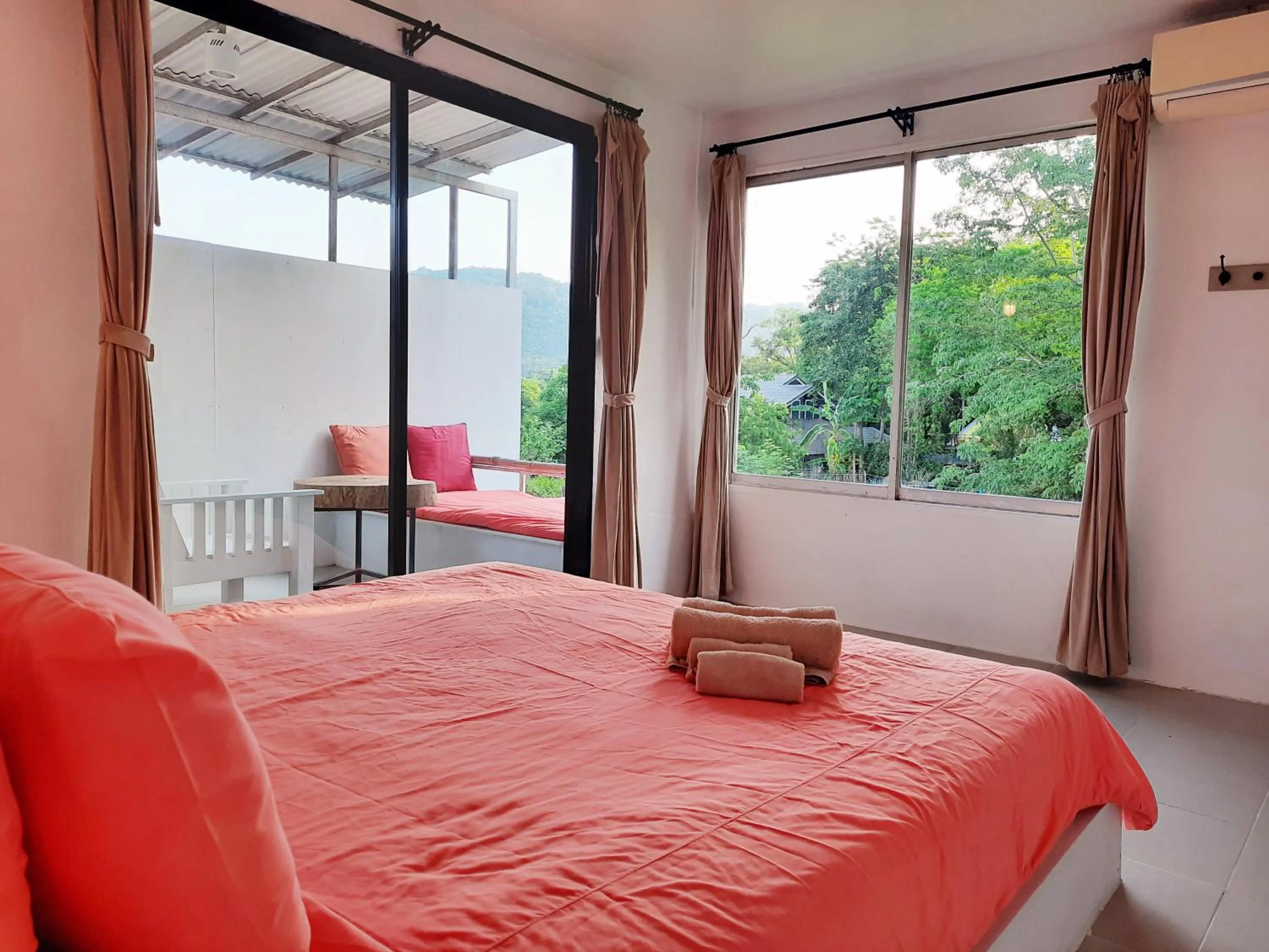 Bed in Chasorn Riverside Resort