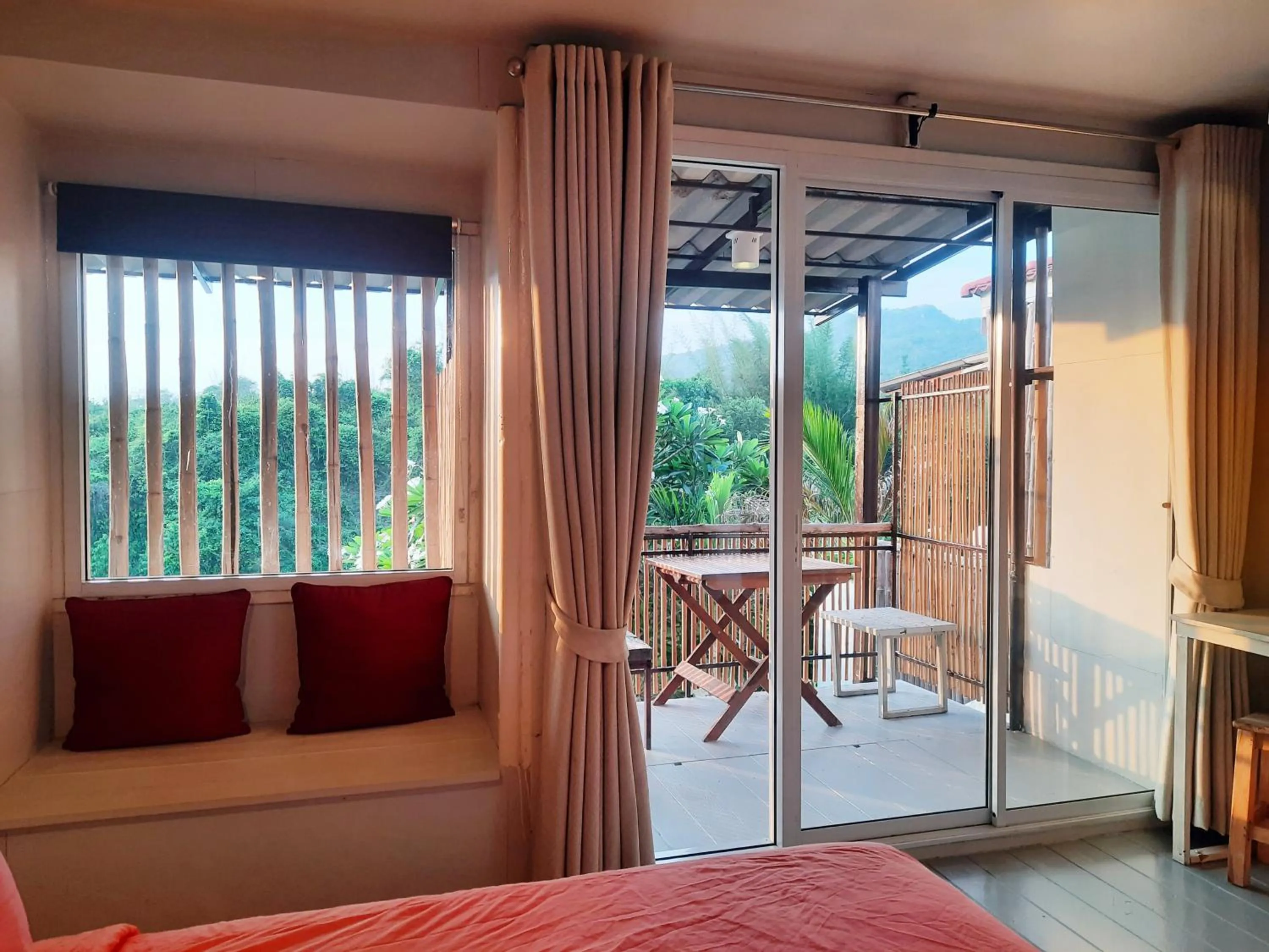 Bed in Chasorn Riverside Resort