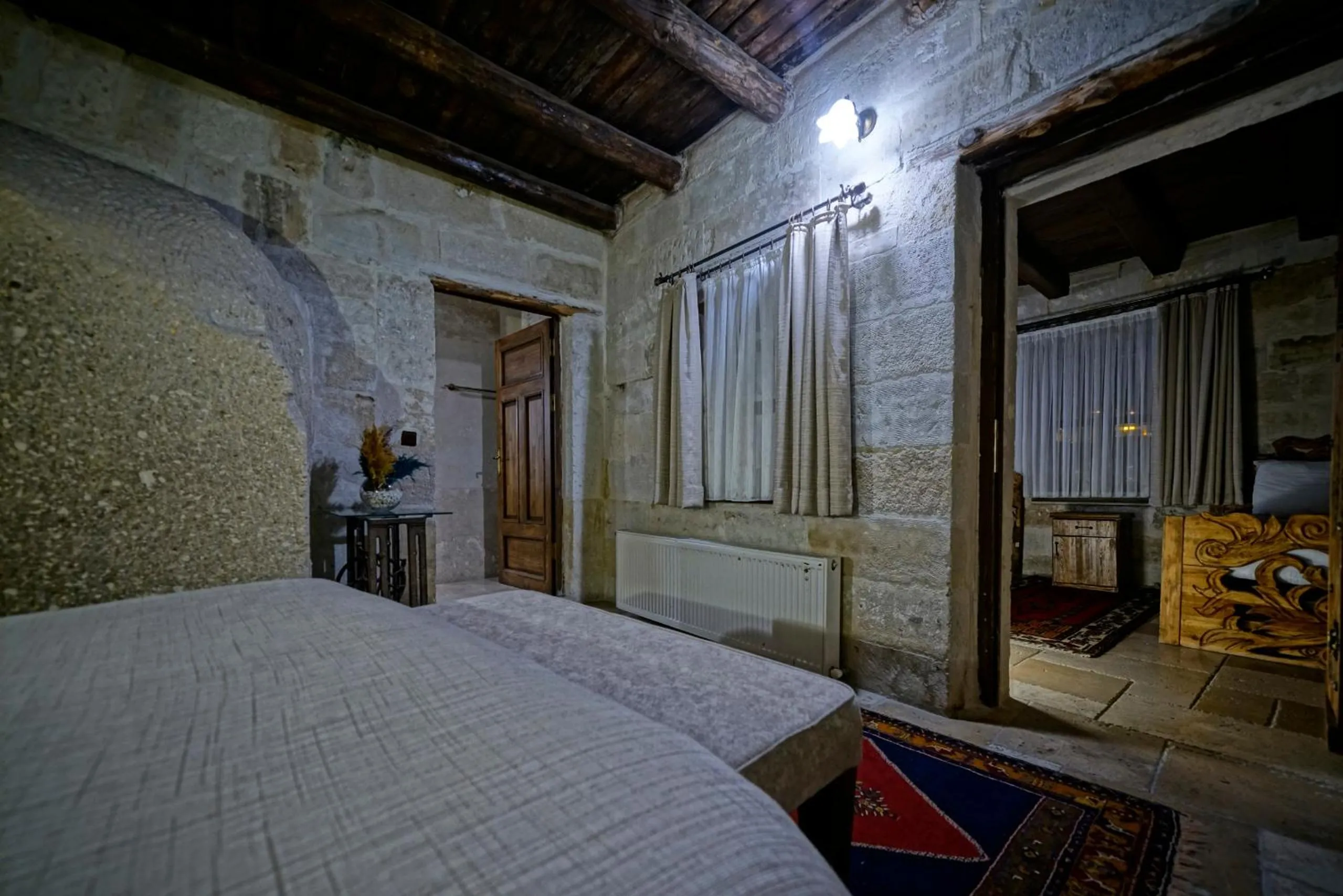 Bed in Holiday Cave Hotel