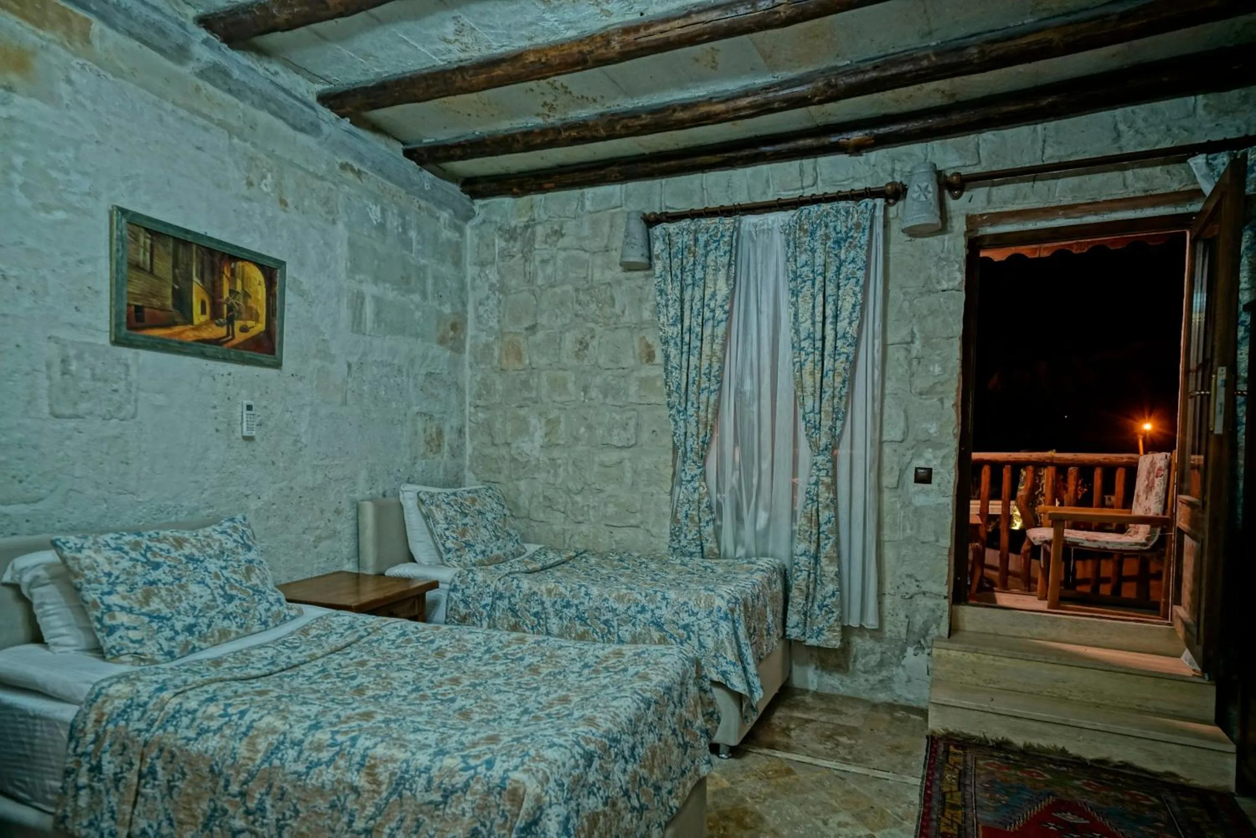 Bed in Holiday Cave Hotel