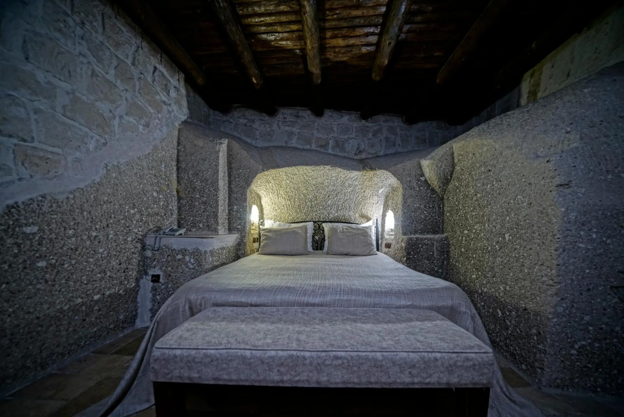 Bed in Holiday Cave Hotel