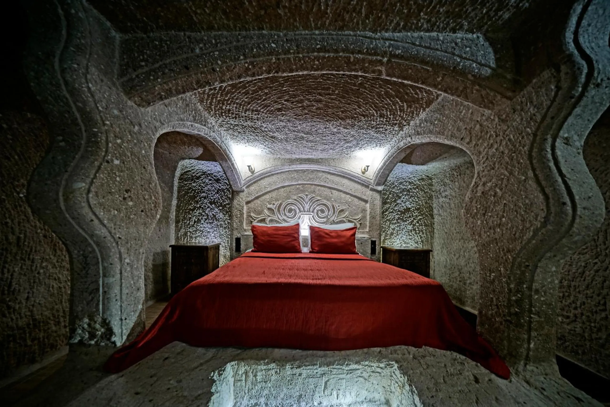 Bed in Holiday Cave Hotel