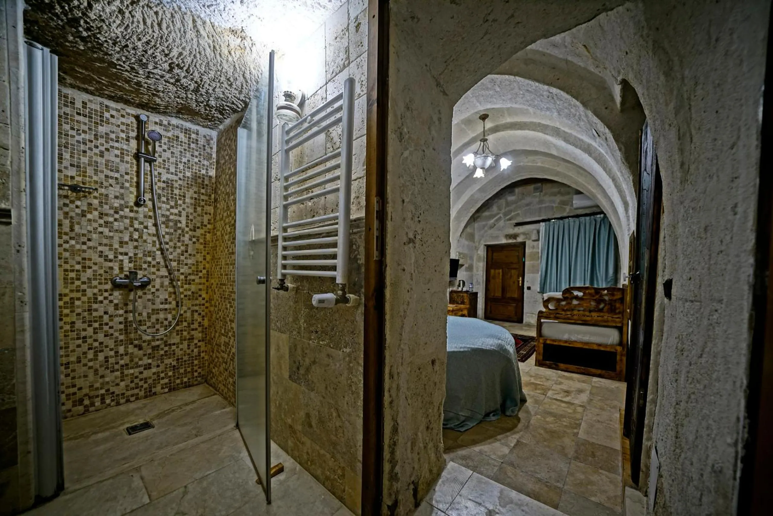 Bed in Holiday Cave Hotel