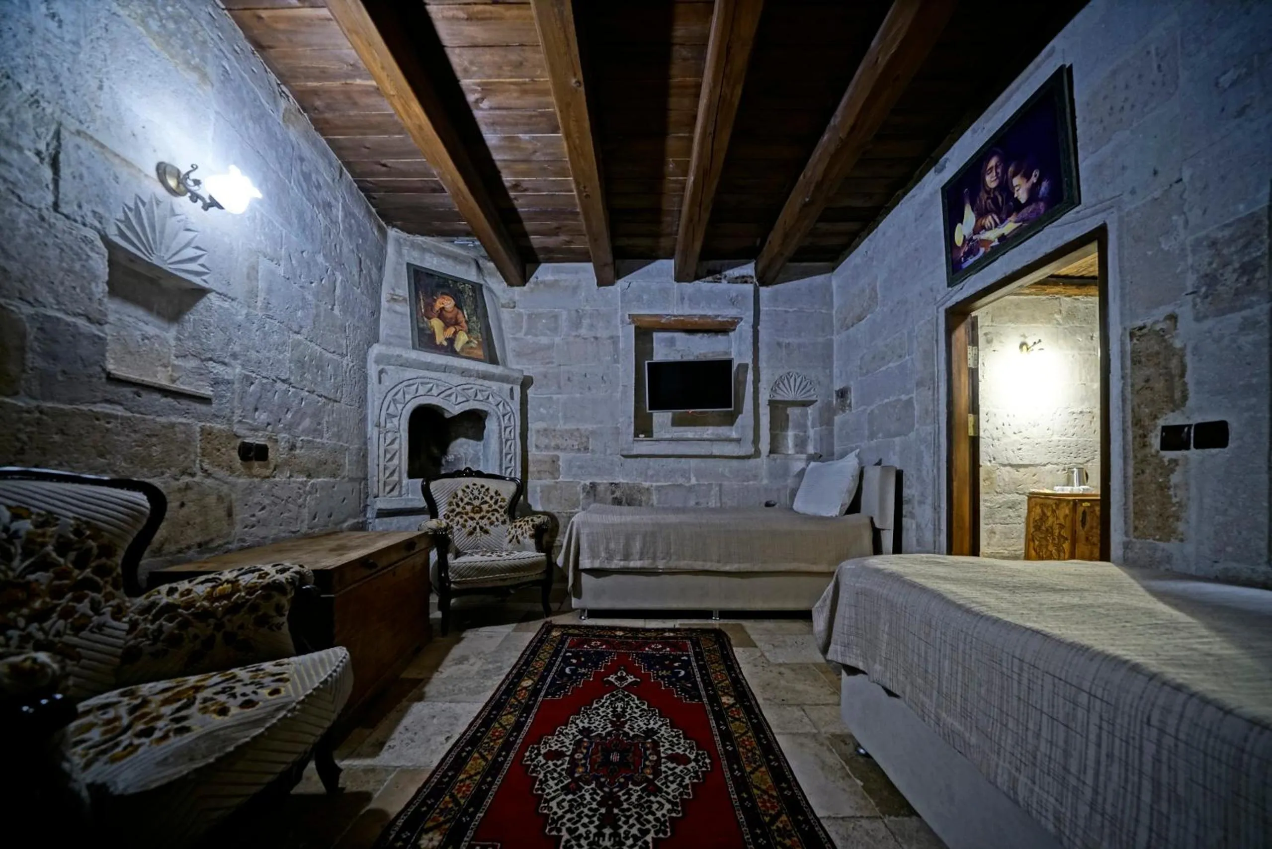 Bed in Holiday Cave Hotel