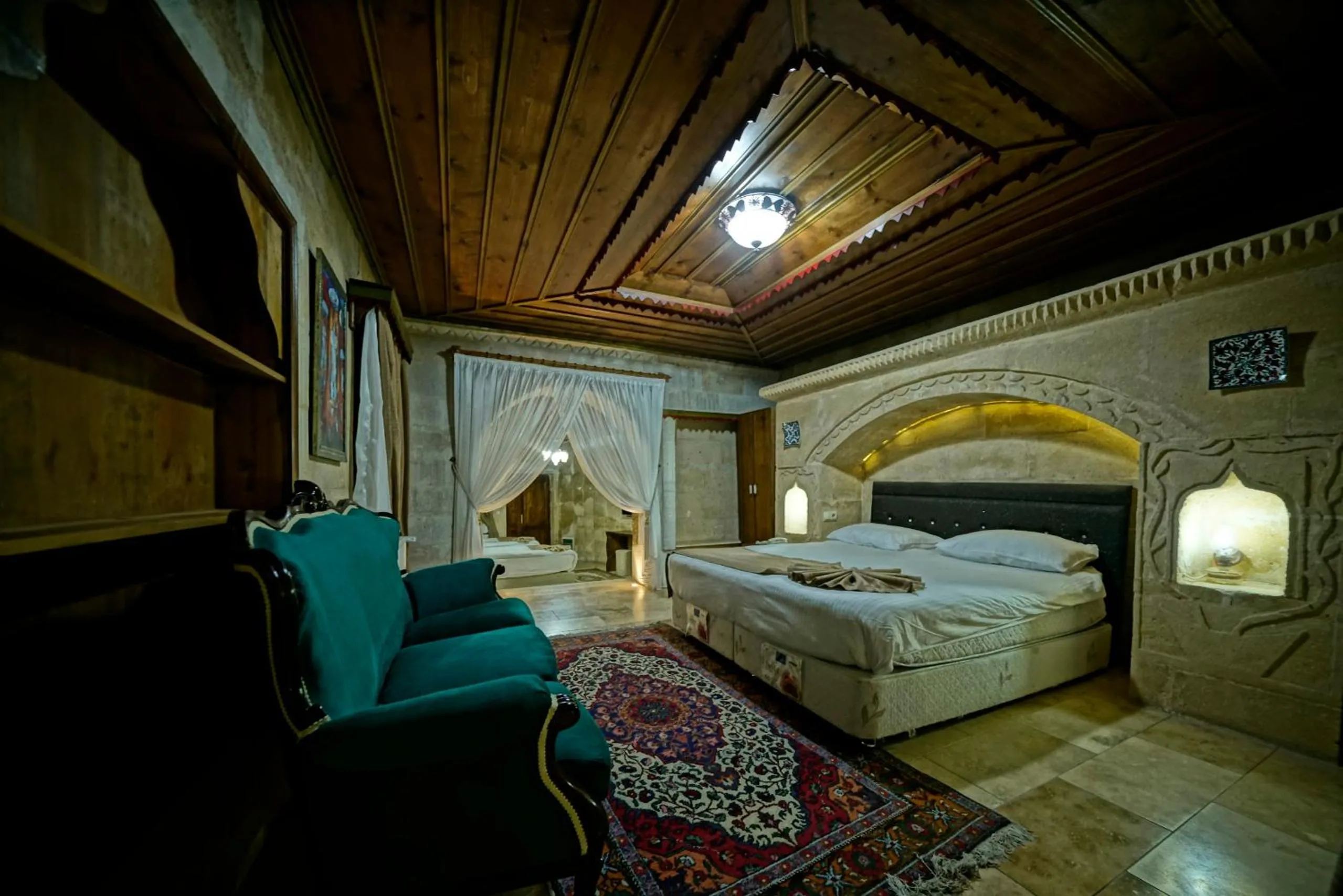 Bed in Holiday Cave Hotel