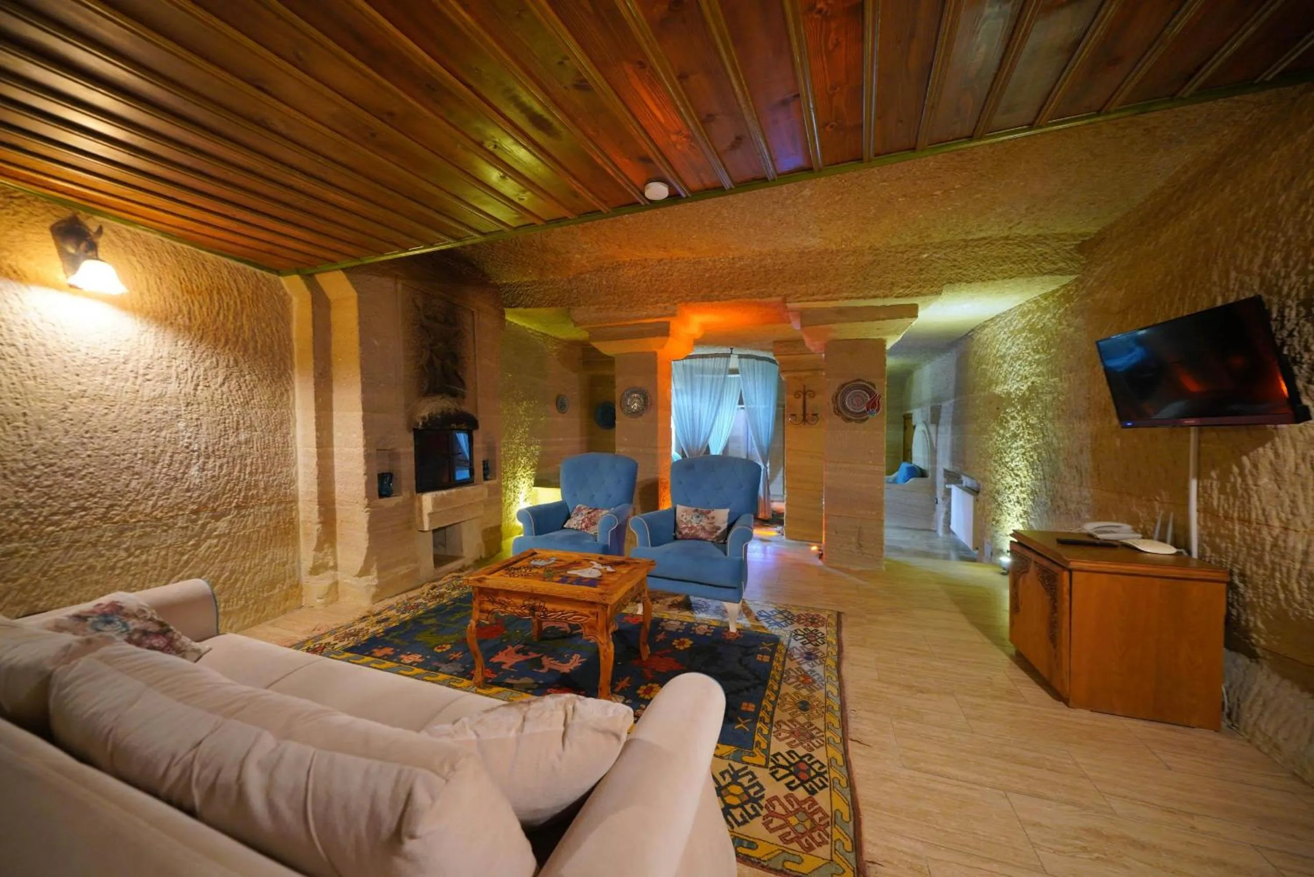 Living room in Holiday Cave Hotel