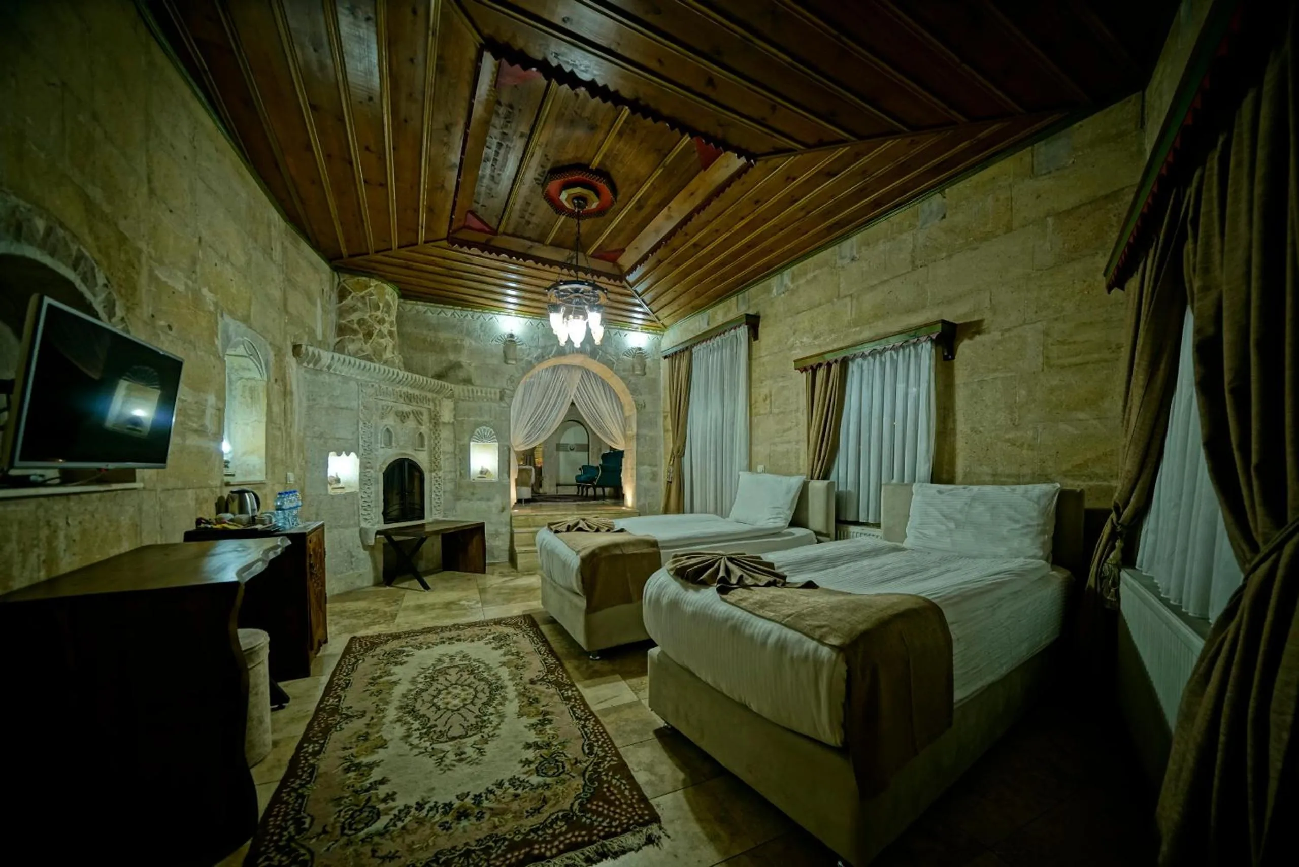 Bed in Holiday Cave Hotel