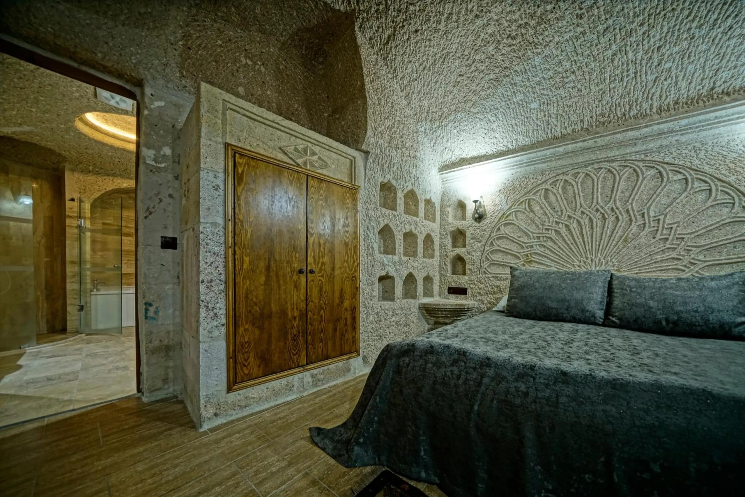 Bed in Holiday Cave Hotel