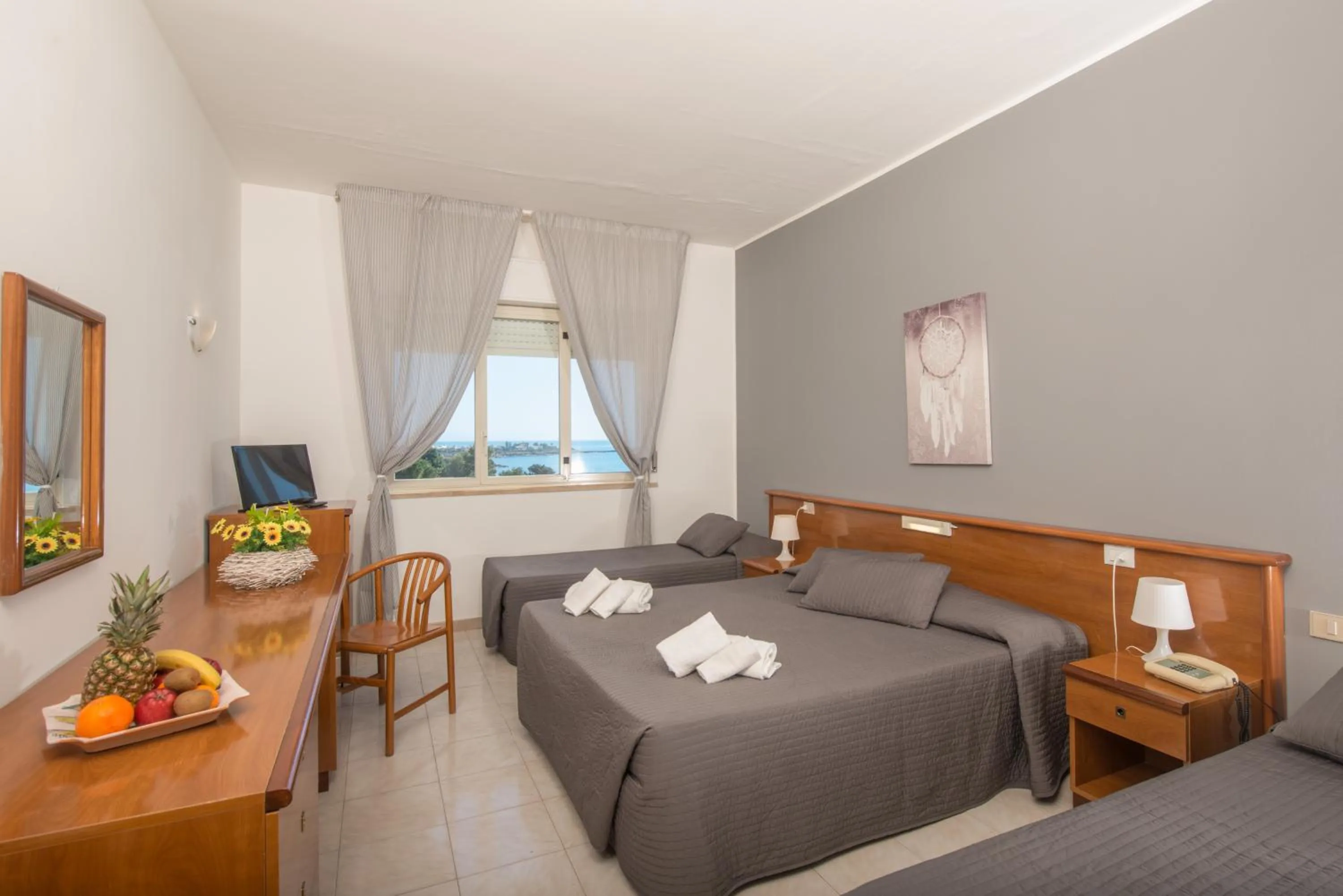 Bed in Hotel President Sea Palace