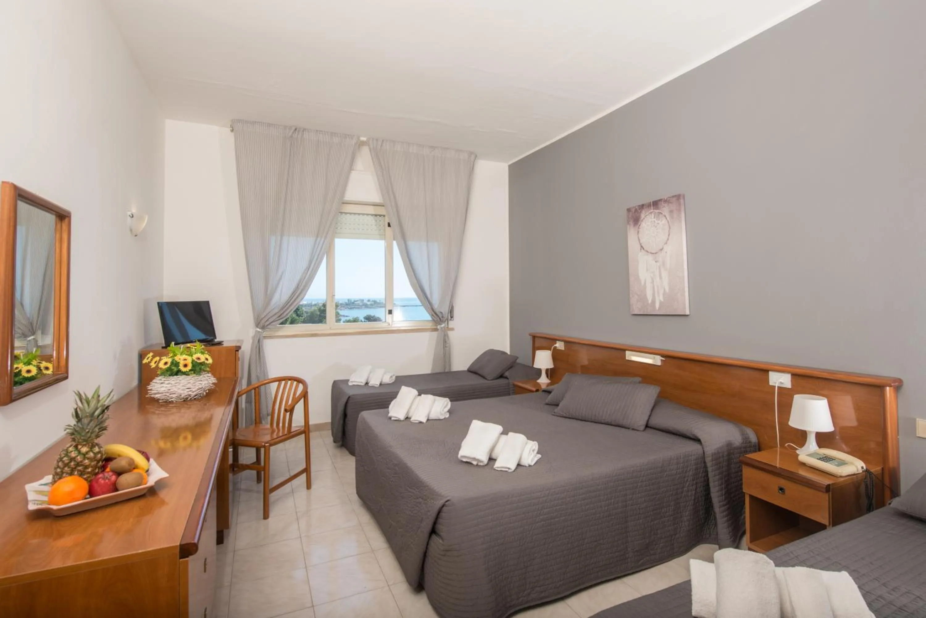 Bed in Hotel President Sea Palace