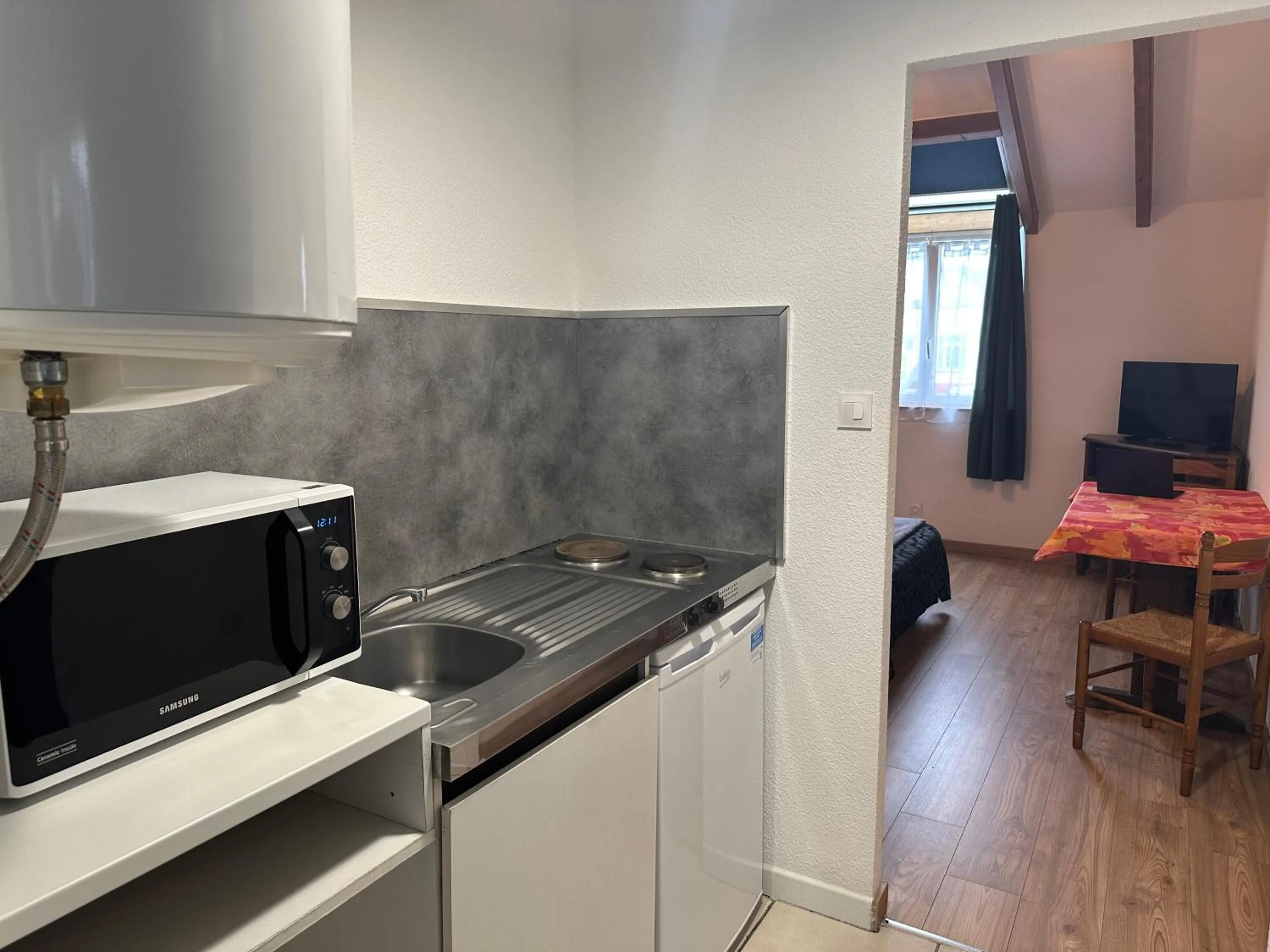 Kitchen or kitchenette in Studio/Hôtel Porte De France