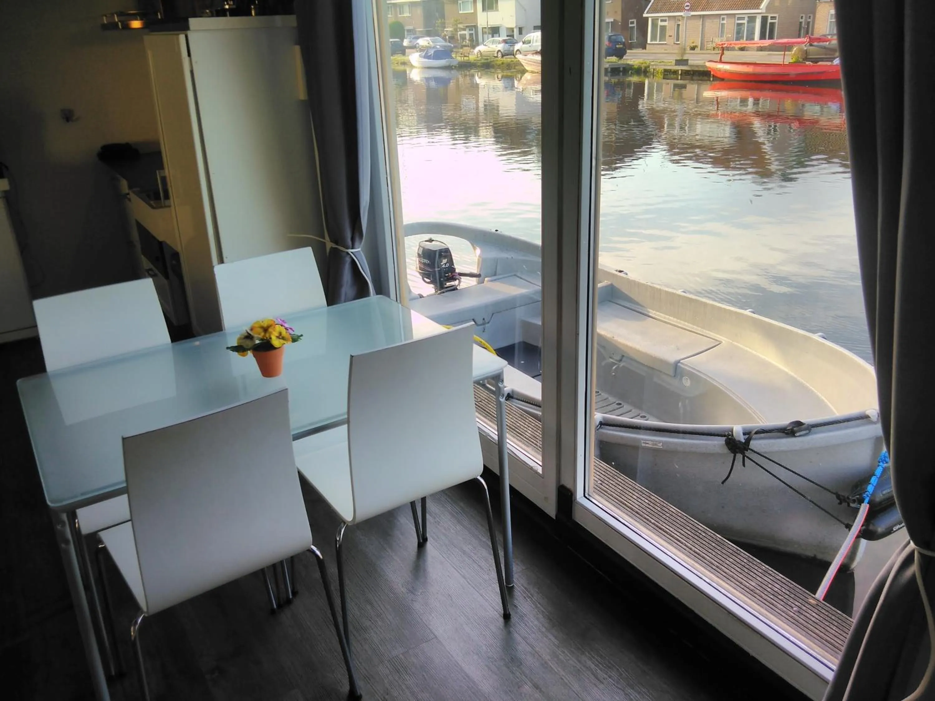 Dining area in Boathouse Amsterdam with bikes