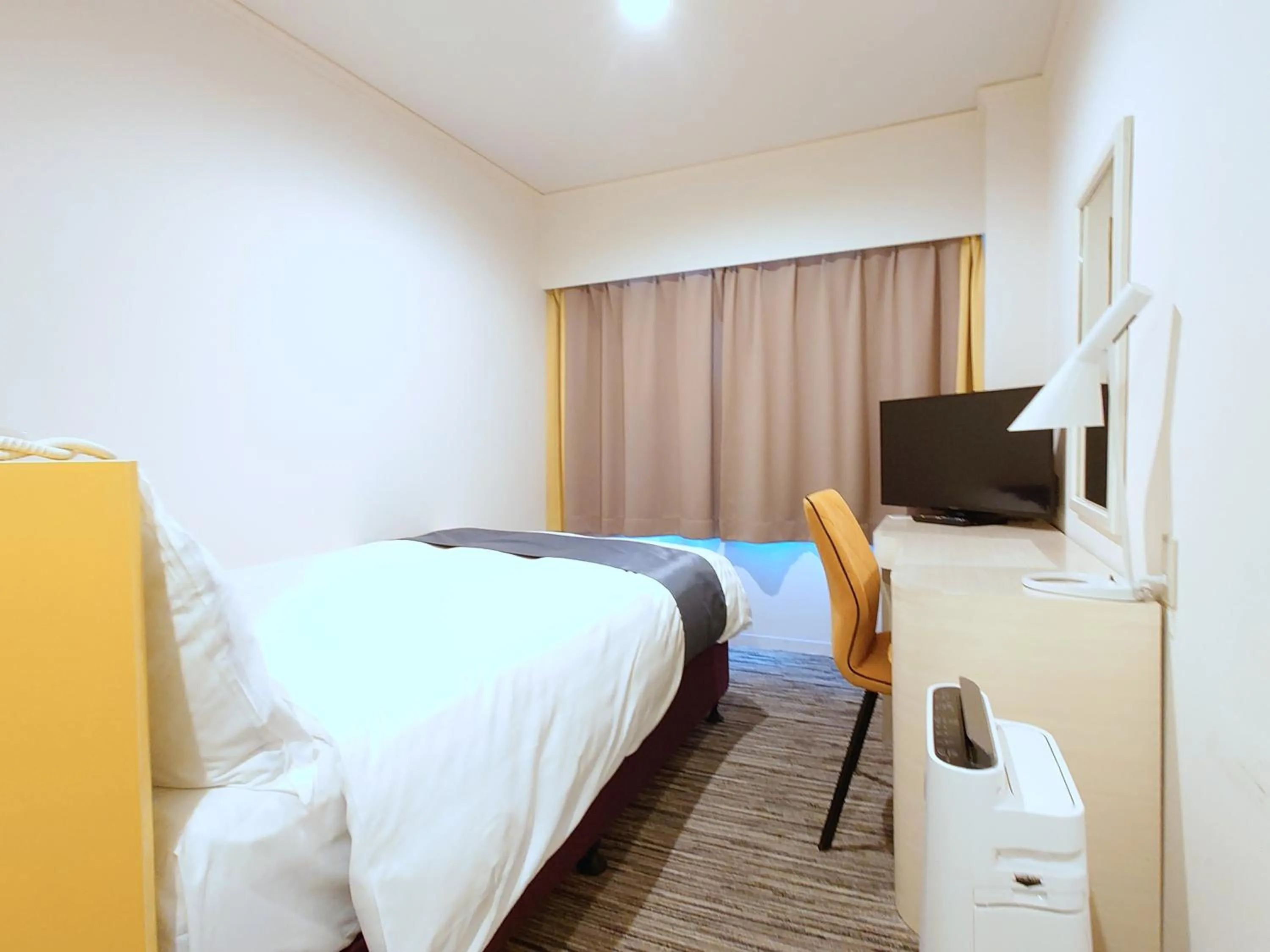 Bed in Hotel Montoview Yonezawa