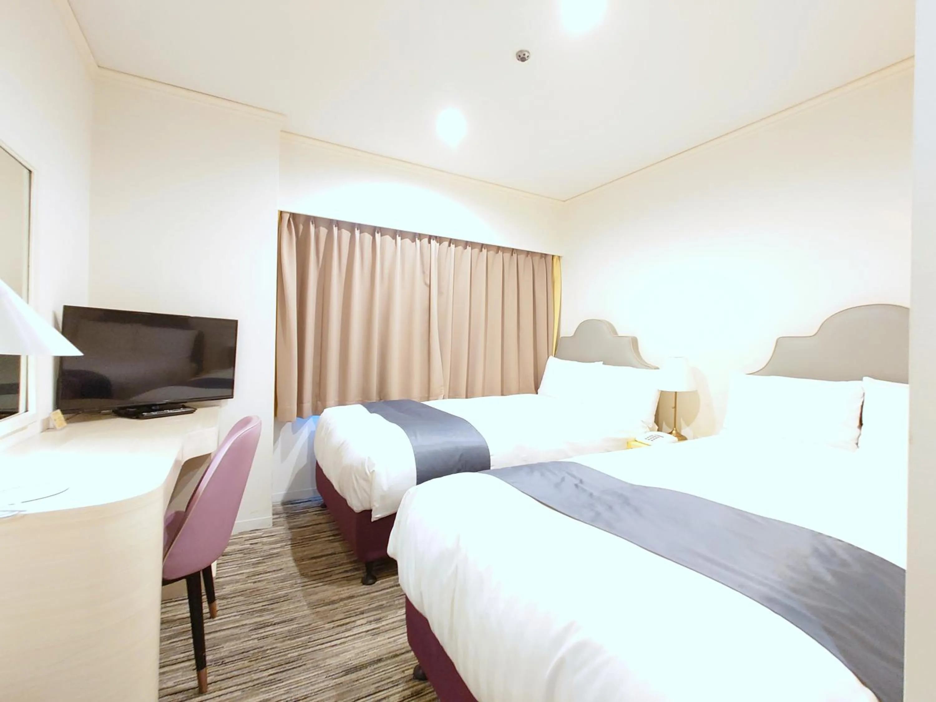 Bed in Hotel Montoview Yonezawa