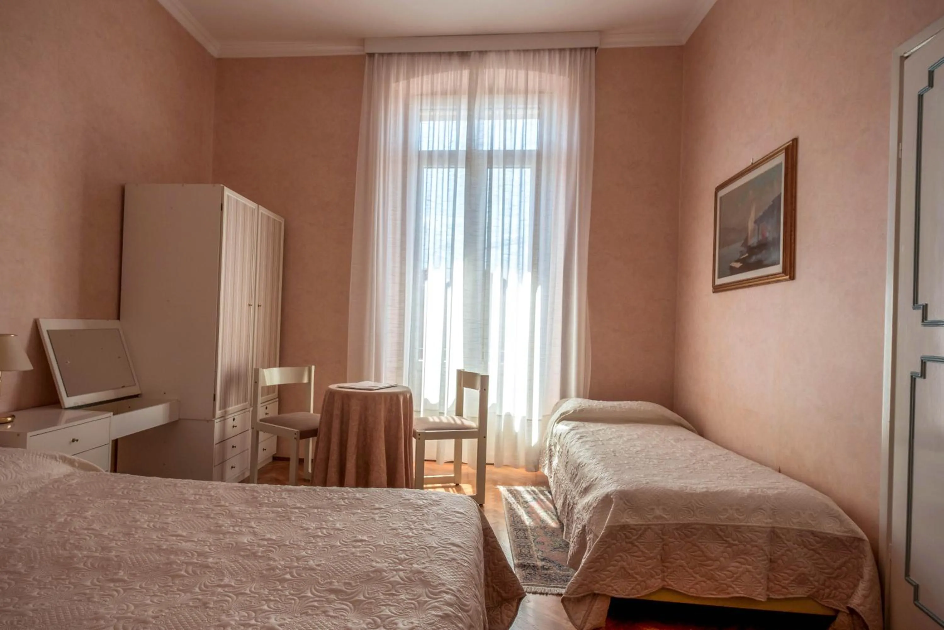 Bed in Hotel Maderno