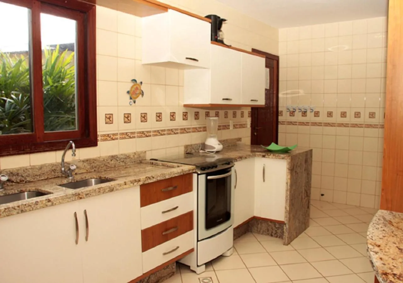 Kitchen or kitchenette in Lagoa Eco Village