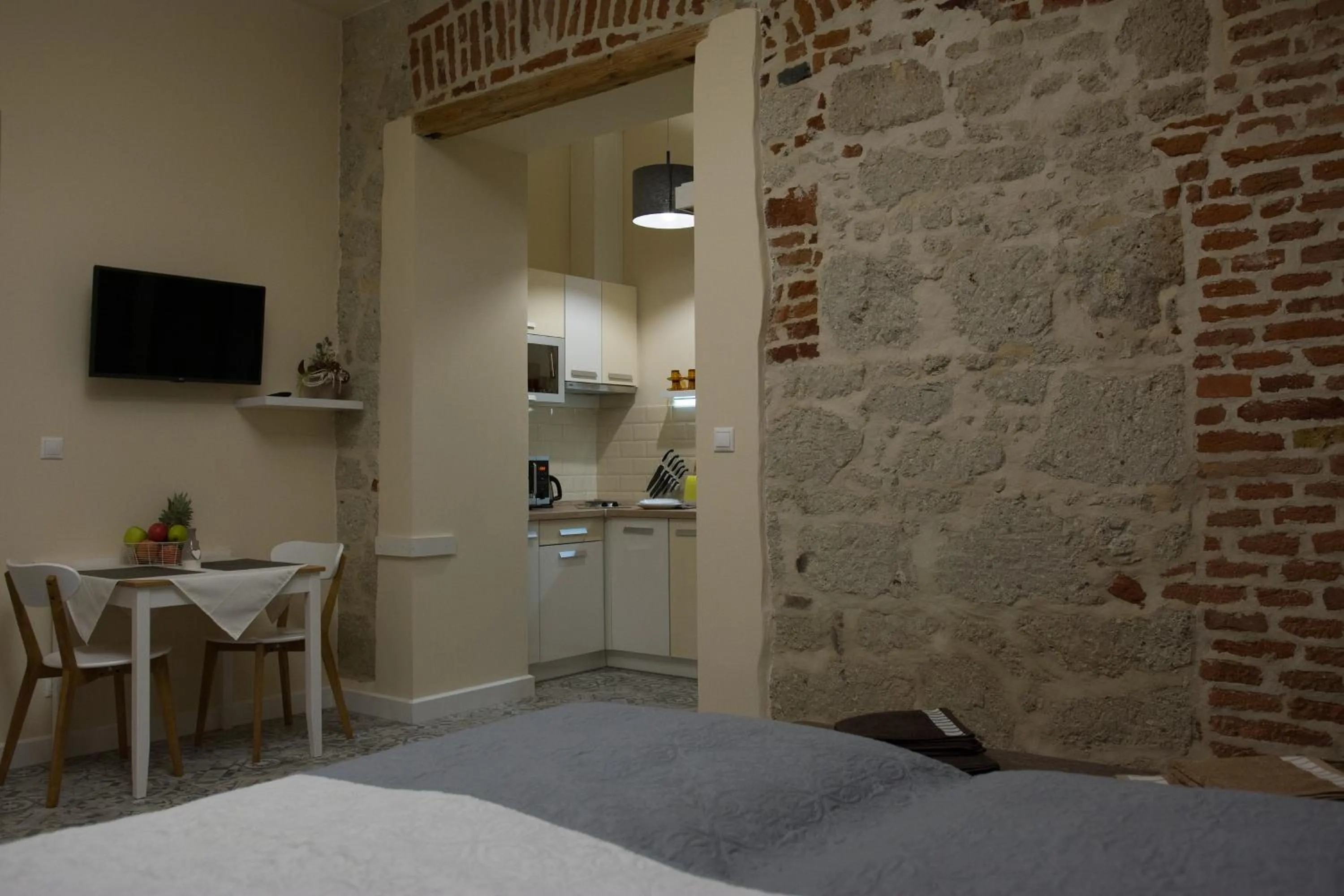 Kitchen or kitchenette, Bed in Zora Apartman