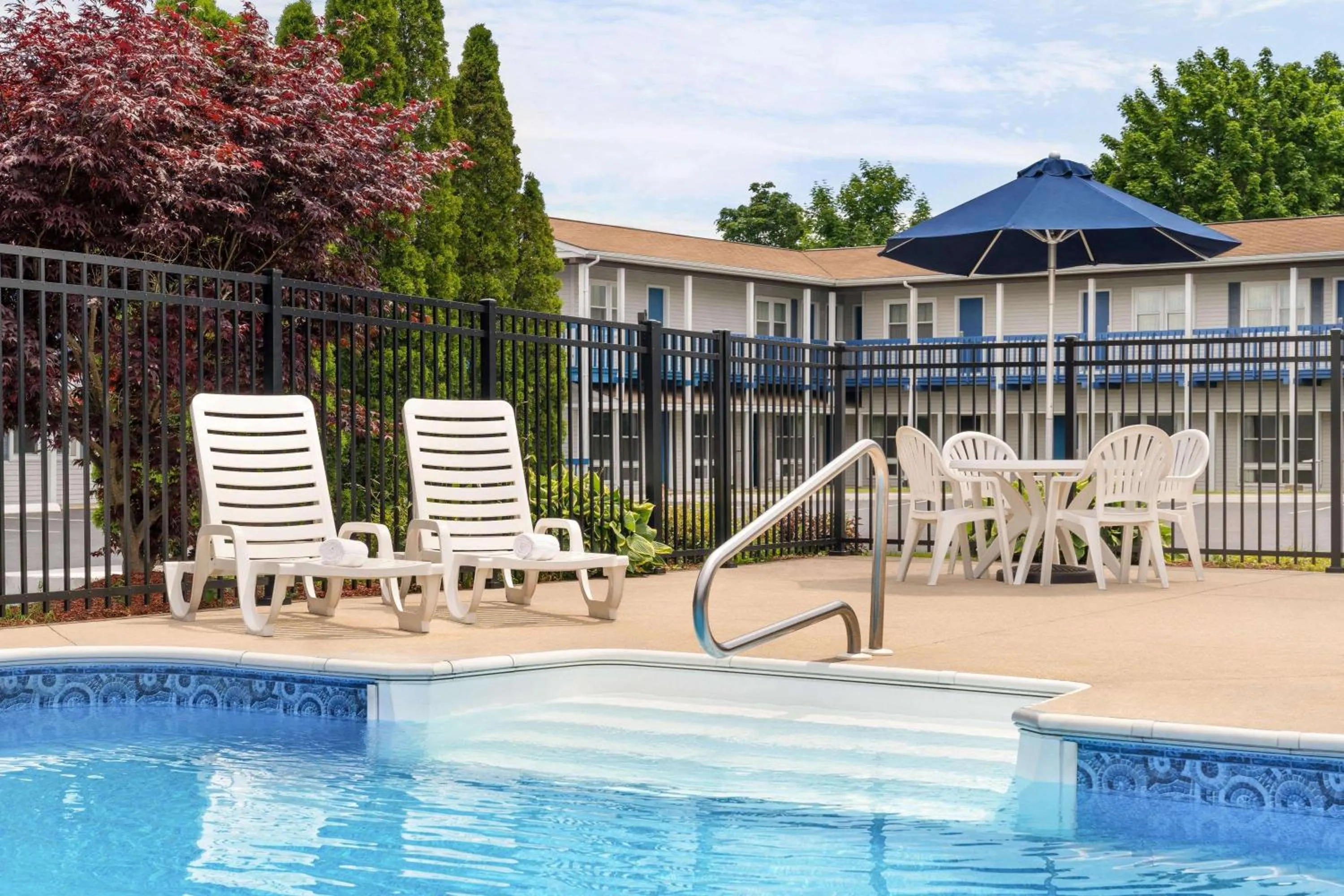 Pool view in Days Inn by Wyndham Middletown/Newport Area
